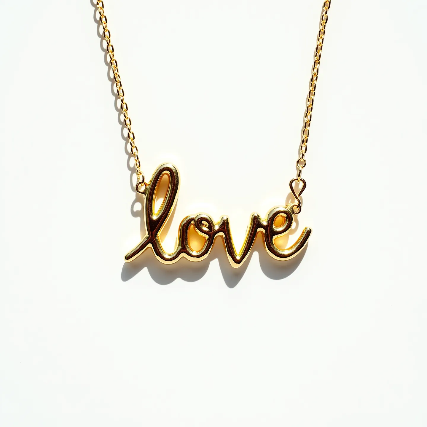 This letter necklace features the word "love" in a cursive script, crafted from a shiny gold material that gives it an elegant and polished appearance. The chain is composed of small, evenly spaced links that support the central pendant seamlessly. The necklace does not appear to include any additional gemstones or embellishments, maintaining a minimalist and timeless style. The attachment between the pendant and chain is simple and secure, ensuring that the focus remains on the delicate lettering. Overall, the necklace embodies a classic and straightforward design, conveying a heartfelt message with sophistication.