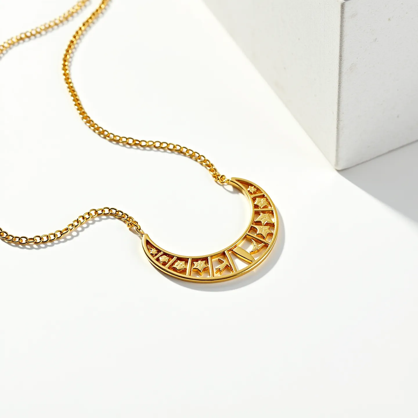 This celestial moon necklace features a polished gold-toned crescent pendant adorned with various celestial motifs, including stars and moons, intricately cut out of the surface. The crescent shape is complemented by a delicate chain, also gold-toned, which seamlessly connects to the pendant at both ends. The pendant's design showcases precise cutouts, lending an ethereal quality to the piece. The chain likely includes a standard clasp closure, ensuring a secure fit around the neck. The combination of the celestial elements and the warm gold finish creates a harmonious and elegant accessory.