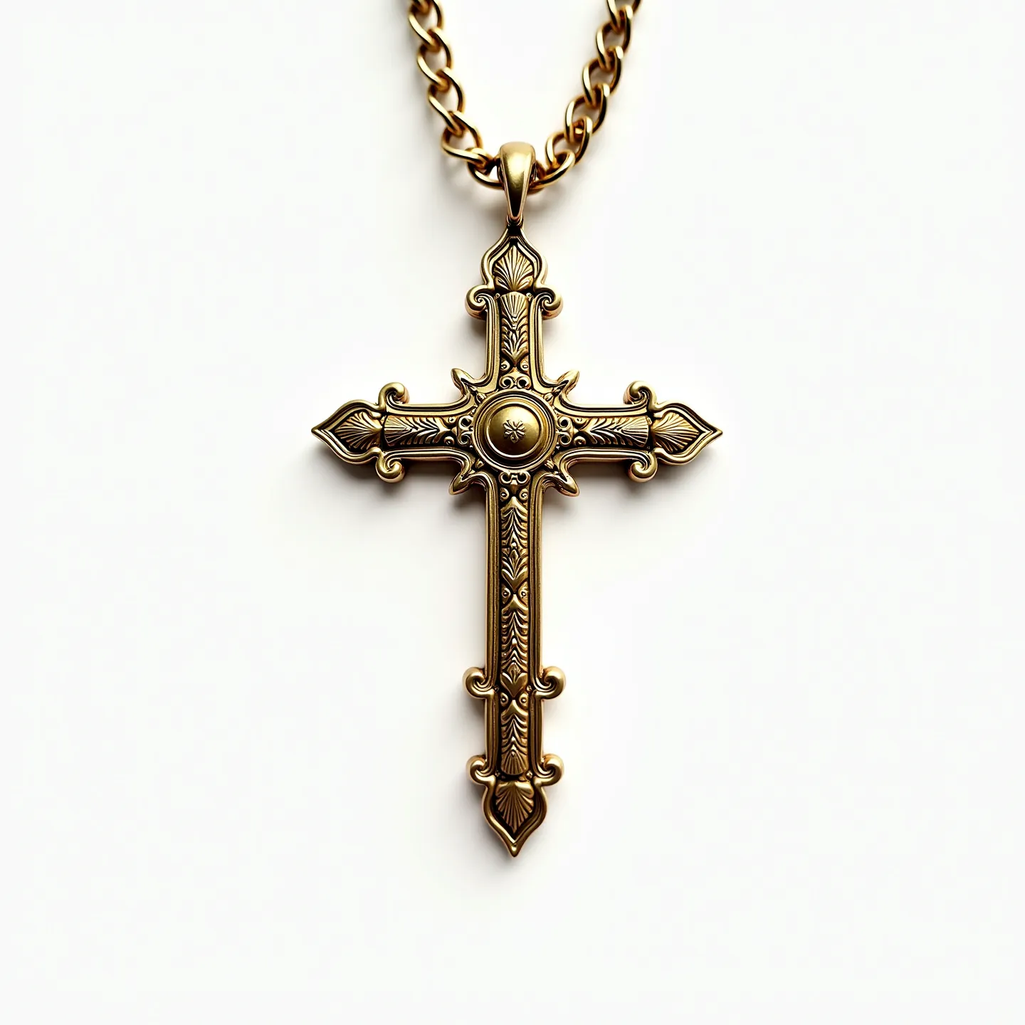 This nail cross necklace is intricately designed with a combination of ornate engravings and a prominent circular detail at the center, featuring a small star-like embellishment. The necklace appears to be crafted from a material with a gold-like finish, giving it a luxurious appearance. The edges of the cross are detailed with ornamental motifs that add depth and dimension. The chain is composed of thick, interlinked segments, complementing the robust design of the cross. The attachment method features a simple yet elegant loop that seamlessly integrates with the chain, maintaining the overall aesthetic of the piece.