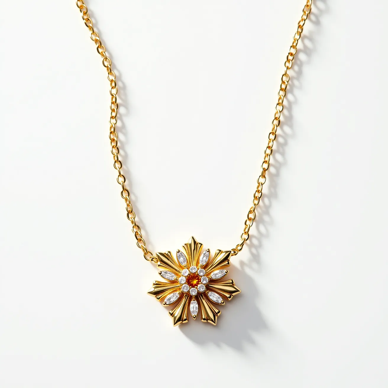 This pendant necklace features a radiant design with a sunburst motif, crafted from gold-toned metal. It showcases a collection of sparkling gems, including white round-cut stones at the center and marquise-cut stones radiating outward, expertly set in a prong setting. The robust chain is composed of oval links, complementing the pendant's opulent style, and is likely secured with a simple clasp for a seamless attachment.