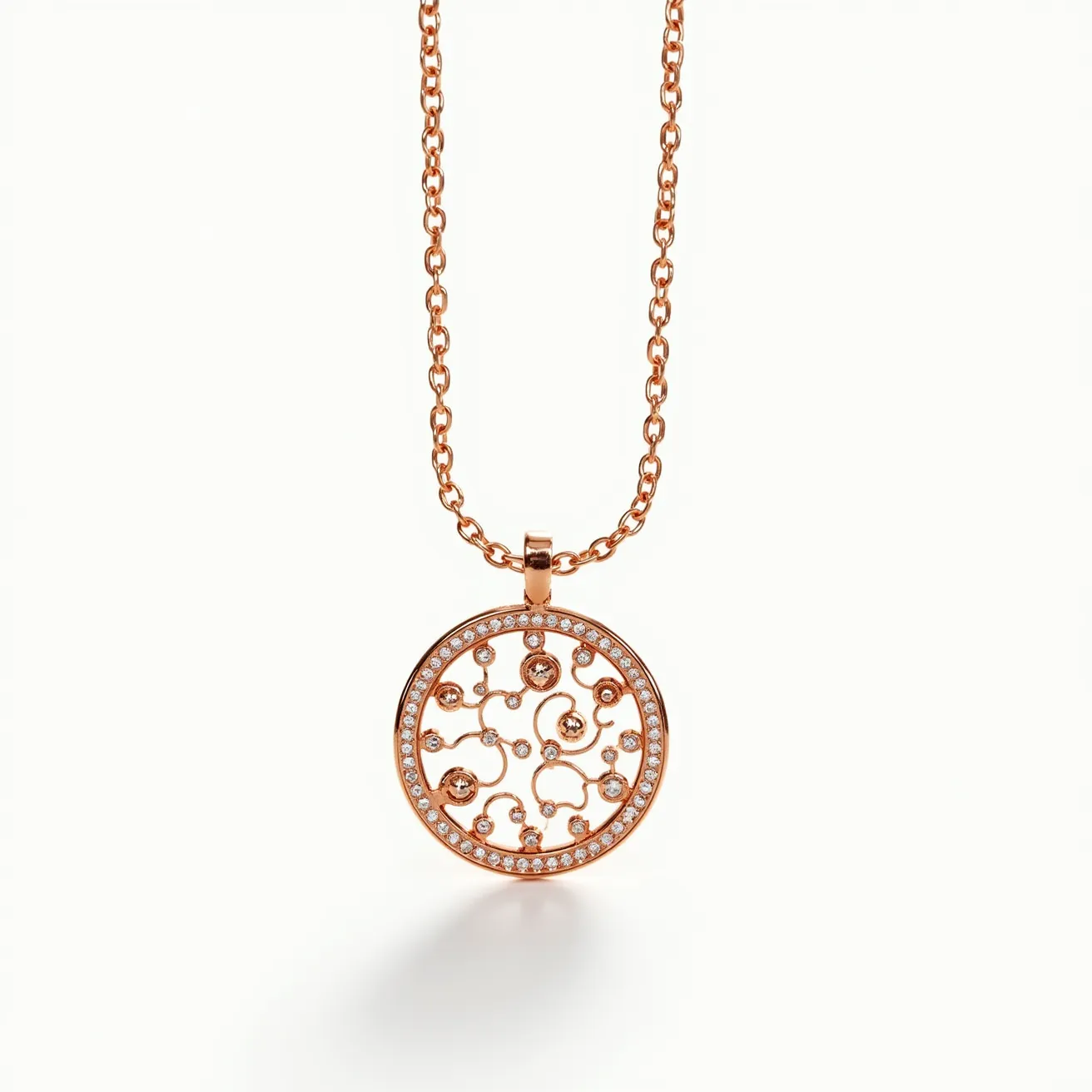 This pendant necklace features a circular rose gold pendant with an intricate swirl pattern adorned with small, round-cut diamonds. The diamonds are set in a way that accentuates the fluid design, providing sparkle and elegance. The chain is composed of rose gold links, matching the pendant and ensuring a cohesive appearance. The clasp is a simple, functional lobster clasp, providing secure attachment when worn. The pendant’s design and materials create a sophisticated and stylish look, ideal for adding a touch of luxury to any outfit.