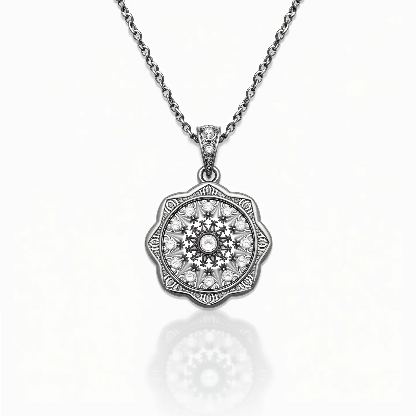 This pendant necklace features an intricately designed medallion crafted from silver with a detailed floral pattern. At its center, a small round gem, likely a diamond or cubic zirconia, is set securely in a bezel setting, adding a subtle sparkle. The pendant itself is bordered with a scalloped edge accentuating the ornate design. The chain is a delicate cable style, complementing the pendant with a cohesive, elegant look. The attachment incorporates a simple bail, adorned with similar small gems, facilitating a smooth connection with the chain.