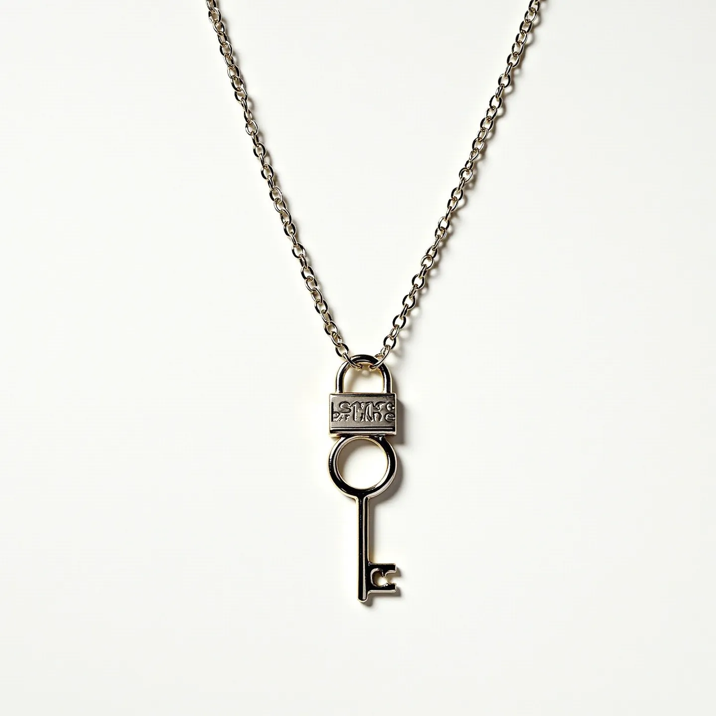 This promise necklace features a delicate chain made of a silver-toned metal, possibly stainless steel or sterling silver, known for its durability and elegant appearance. The pendant is designed like a key with an integrated padlock at the top, symbolizing the themes of commitment and trust. The key and padlock are crafted from the same shiny metal, adding a cohesive look to the necklace. The pendant's setting does not include any gems, focusing instead on the intricate design of the key itself. The necklace is secured with a classic lobster clasp, providing a reliable closure to ensure it stays securely in place when worn.