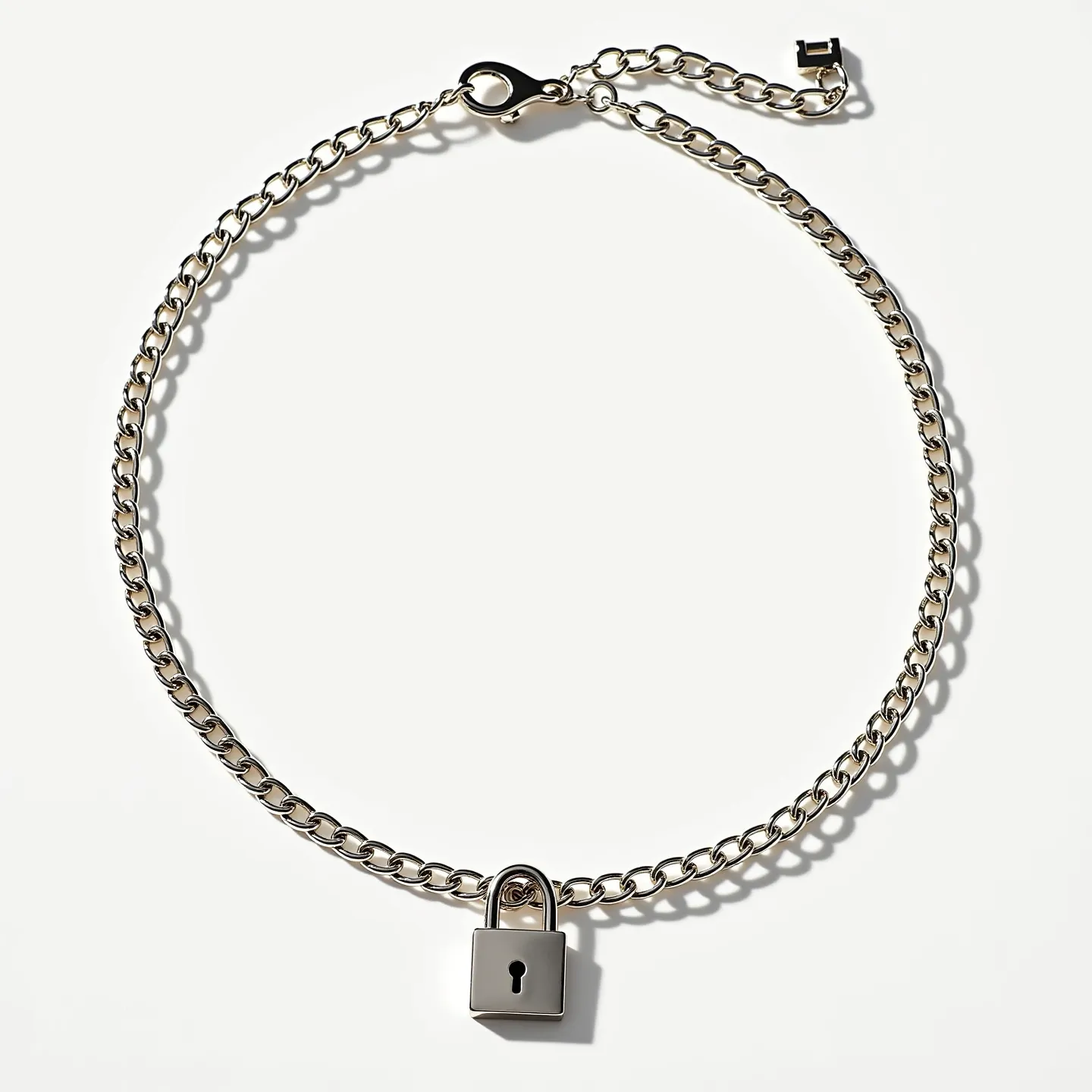 This promise necklace features a polished, metallic chain composed of interlinked loops that culminates in a central padlock motif. The chain appears to be crafted from stainless steel or a similarly lustrous material, lending it a sleek and modern appearance. The padlock serves as the focal point and symbolizes commitment, adding a meaningful touch to the necklace. On one end of the chain, a lobster clasp ensures secure fastening, complemented by an adjustable extension chain for versatile sizing. The overall design is minimalist, emphasizing the symbolic element of the padlock.