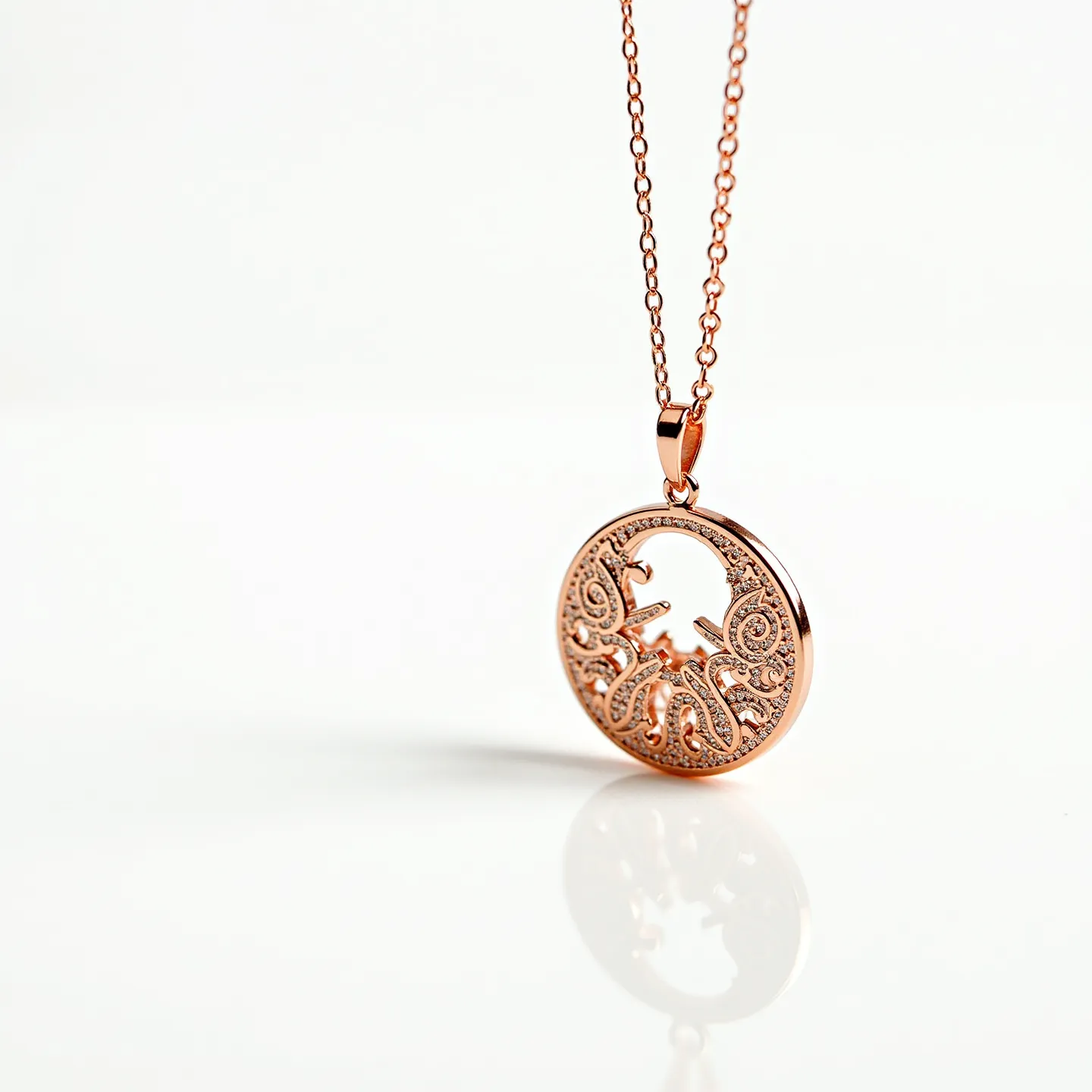 This rose gold necklace features an intricately designed pendant with a circular shape and delicate filigree work, showcasing a tree of life motif. The pendant is crafted from rose gold, offering a warm, pinkish hue that enhances its elegant appearance. Small, sparkling stones are embedded around the filigree, adding subtle glimmers and visual depth to the design. The chain is a fine link design, complementing the pendant with its smooth texture and sophisticated finish. The attachment is a simple loop clasp, ensuring easy wearability and a secure fit.