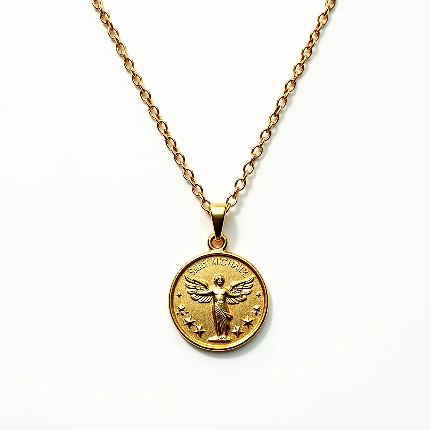 This Saint Michael necklace features a round medallion made of what appears to be gold or gold-plated metal, with a finely detailed depiction of Saint Michael in the center, surrounded by a series of small star accents. The medallion hangs from a gold-toned chain composed of simple, oval links that provide a classic and elegant look. The pendant is attached to the chain with a smooth, rounded bail, which allows for easy movement and display. No additional gems or stones are present on the pendant, emphasizing the intricate metalwork and design of the medallion itself.