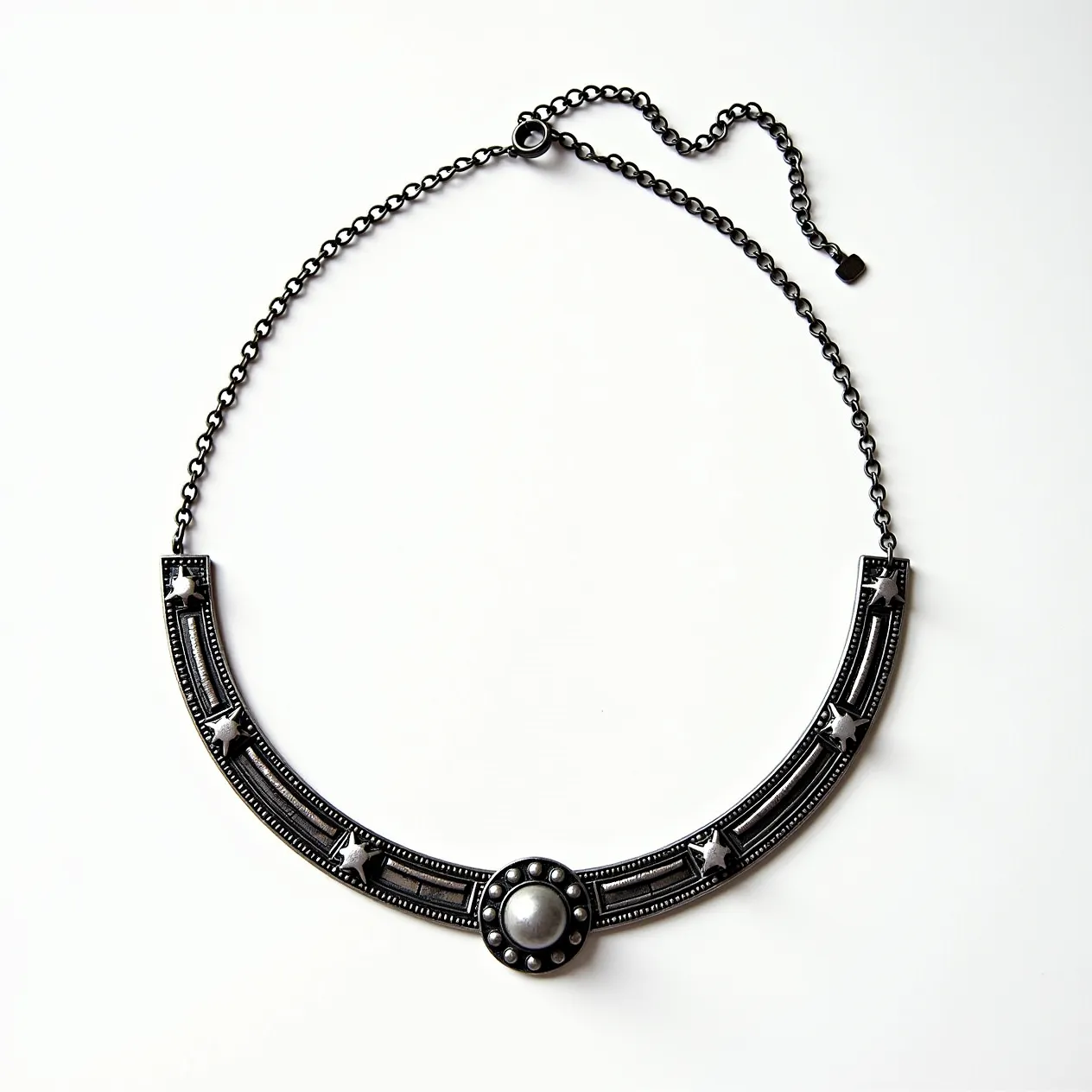 This silver choker necklace features an elegant design with a central round silver-toned setting that resembles a pearl, surrounded by a circle of small metal beads. The necklace is crafted from a series of curved bars embellished with star motifs, providing a celestial aesthetic. The pieces are linked with a sturdy chain, closing with a classic lobster clasp that allows for adjustable length to ensure a comfortable fit.