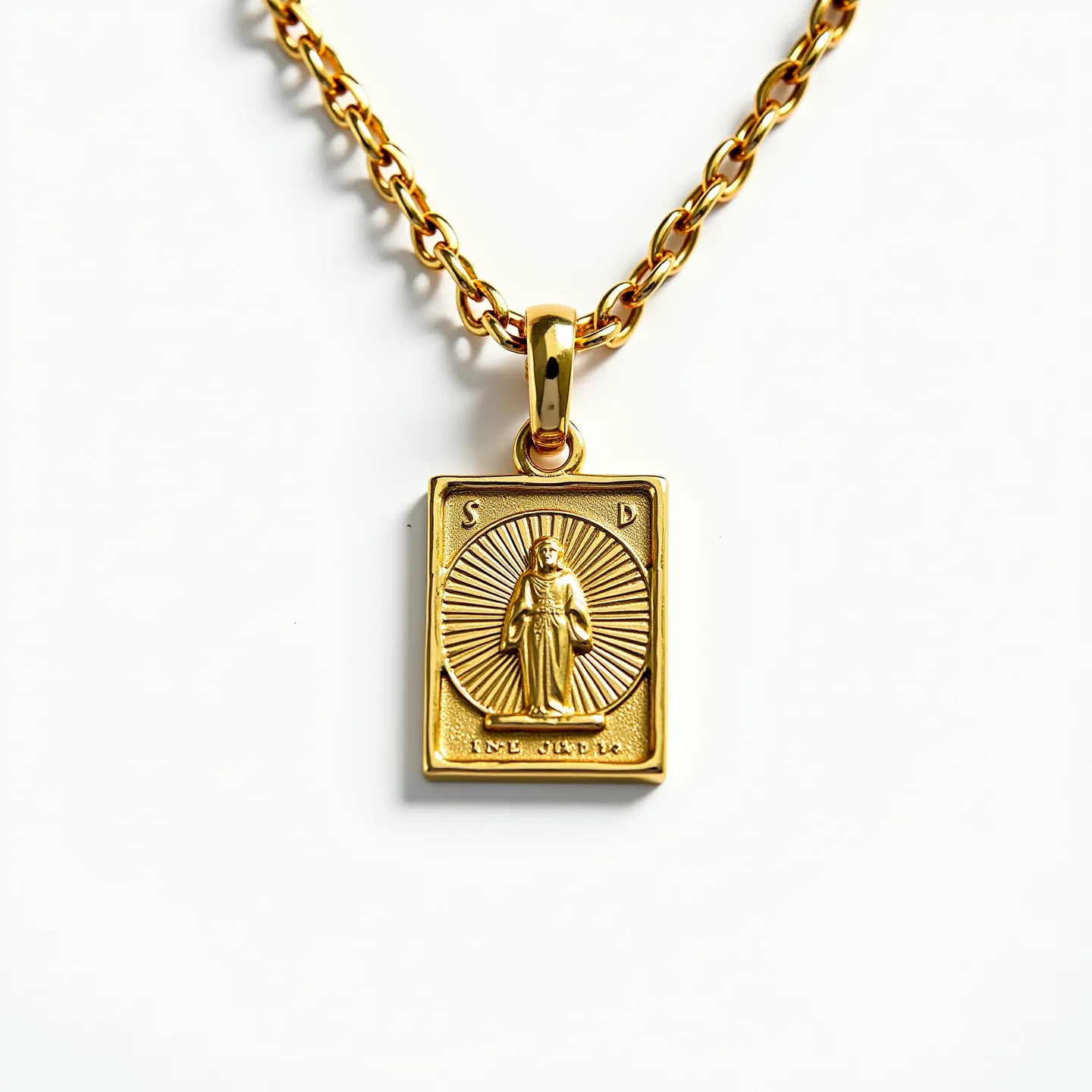 This St. Jude necklace features a gold-toned rectangular pendant depicting the figure of St. Jude against a radiating backdrop. The pendant is crafted with intricate details, enhancing the saint's attire and the surrounding rays. The necklace includes a sturdy, polished chain with interconnected links, contributing to its overall elegant appearance. The bail is designed to secure the pendant firmly on the chain, allowing for smooth movement. The necklace is attached with a standard clasp, ensuring ease of wear and security.