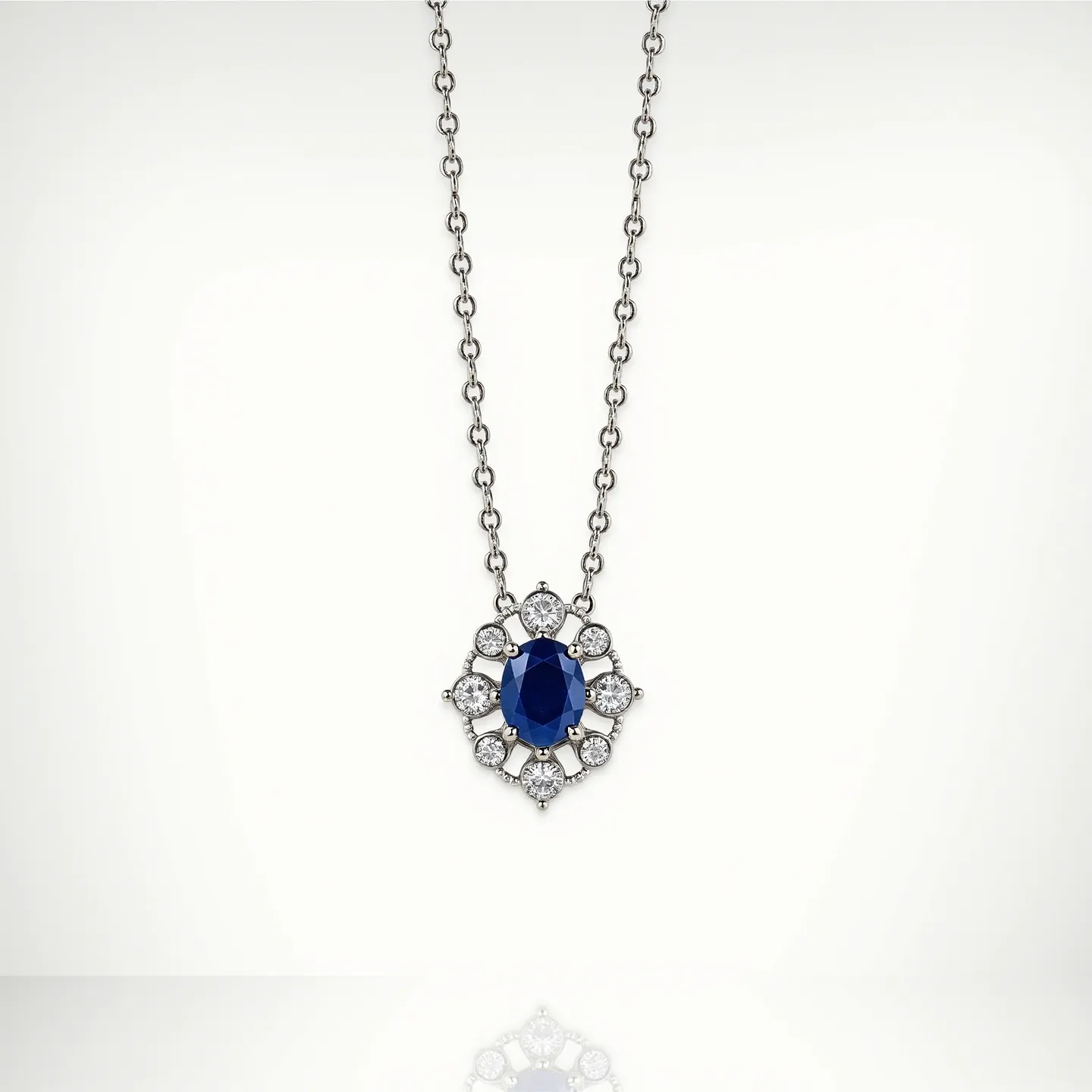 This stone necklace features a striking design with a central oval-cut blue gemstone, likely a sapphire, set prominently in a finely crafted metal setting. Surrounding this central stone are small round-cut clear gemstones, possibly diamonds, arranged in a halo to enhance the central stone's brilliance. The pendant is connected to a delicate chain with evenly spaced links, providing a harmonious balance to the design. The chain appears to be made of a polished metal that complements the setting of the stones, ensuring a cohesive look. The necklace likely features a clasp mechanism for secure fastening, ensuring both elegance and functionality.