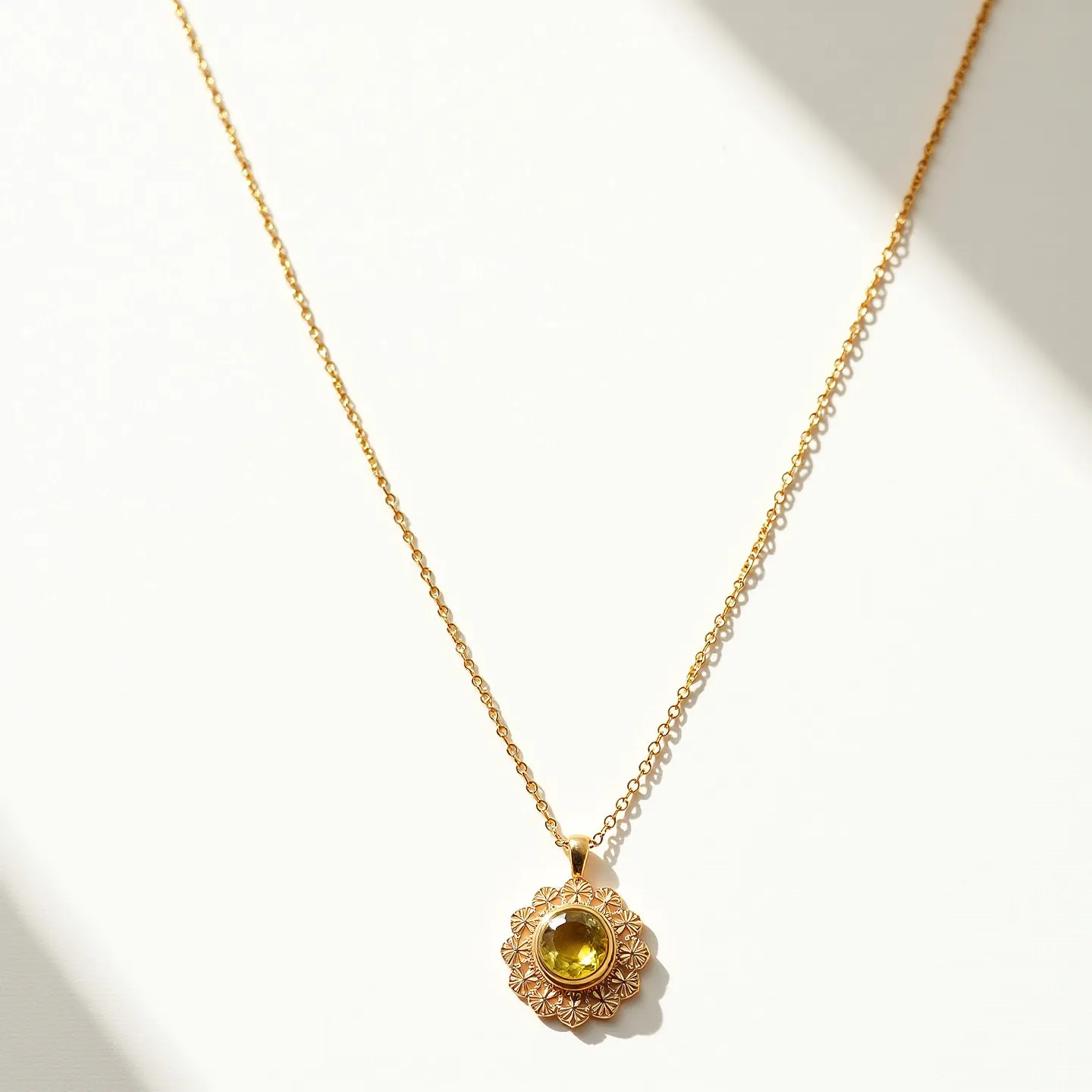 This stone necklace features a delicate gold chain suspending a beautifully crafted pendant. The pendant itself showcases a prominent round-cut yellow stone that catches the light, highlighted by an intricate floral design in its setting. The stone is encased in a bezel setting which adds a touch of sophistication to the overall piece. The chain is finely linked and connected by a subtle, yet secure, clasp, ensuring both functionality and elegance.