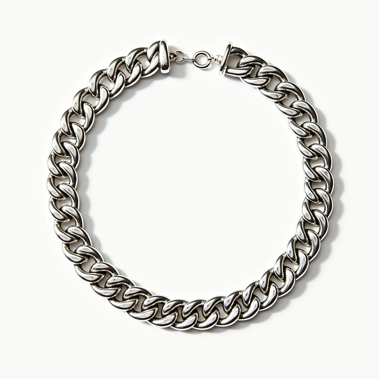 This thick chain necklace features a series of interlocking silver-toned links, suggesting a robust construction likely made from stainless steel or a similar durable metal. The links are smooth and polished, offering a sleek and lustrous appearance. The necklace is secured with a ring clasp, providing a functional and secure fastening method. The overall design is bold and classic, making it a versatile accessory suitable for various occasions.