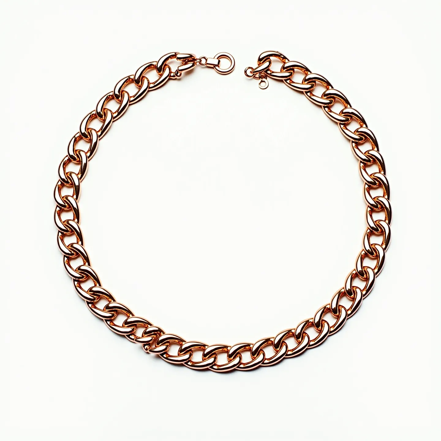 This thick chain necklace features a series of interlocking oval links with a polished, reflective finish that suggests it may be made from metal, such as gold or gold-plated material. The necklace is secured with a round spring ring clasp, providing both functionality and durability. There are no visible gemstones or decorative stones on the links, emphasizing a sleek and modern aesthetic. The design is bold and substantial, making it a statement piece suitable for various occasions.