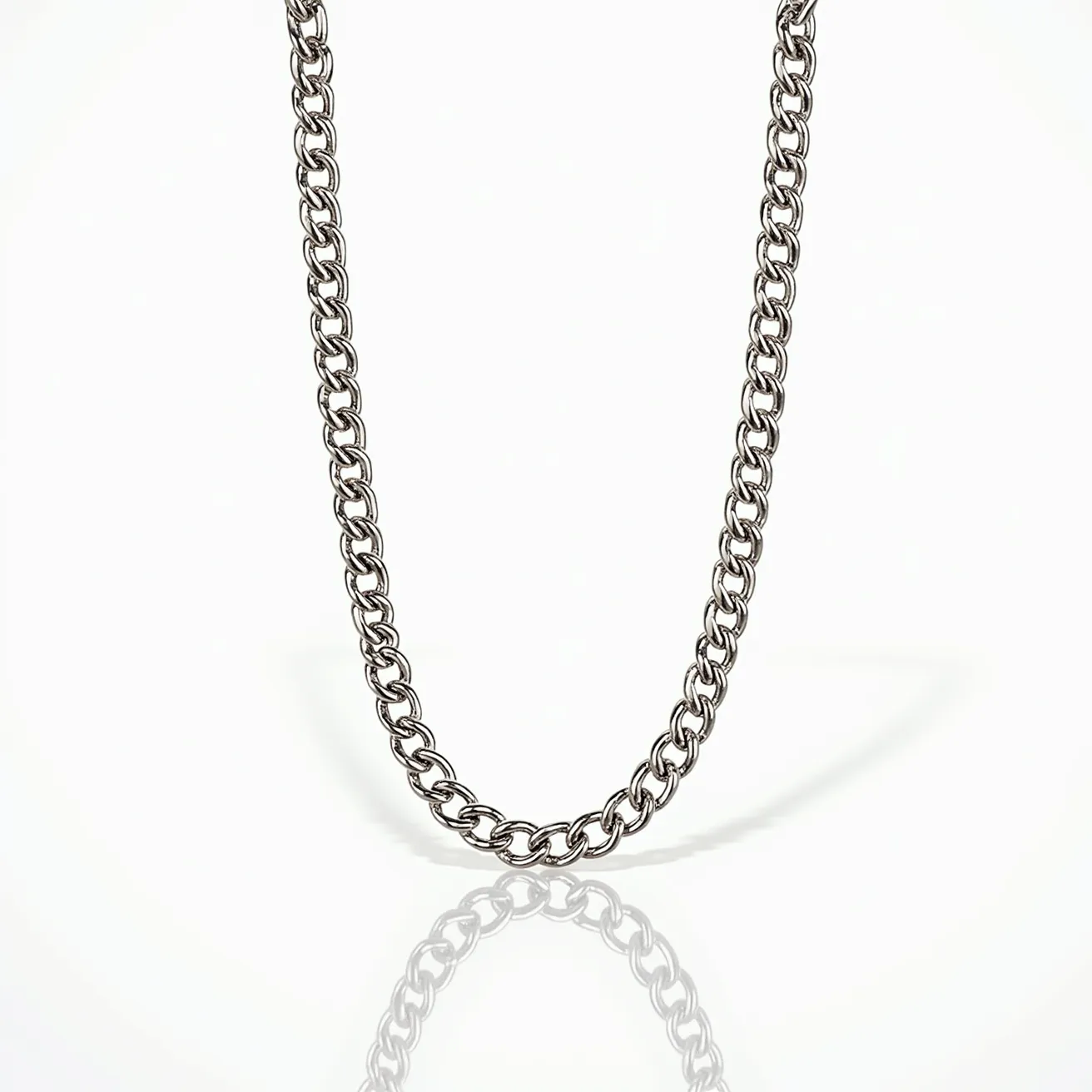 This white gold chain is crafted with a series of interlocking links, giving it a classic and elegant appearance. The links are smoothly finished, enhancing the reflective quality of the white gold, which adds a sophisticated shimmer to the piece. There are no visible gems or stones embedded in the chain, indicating a focus on the purity and simplicity of the metal itself. The chain appears to have a consistent design throughout, with no visible interruptions or additional attachments in the photographed section.