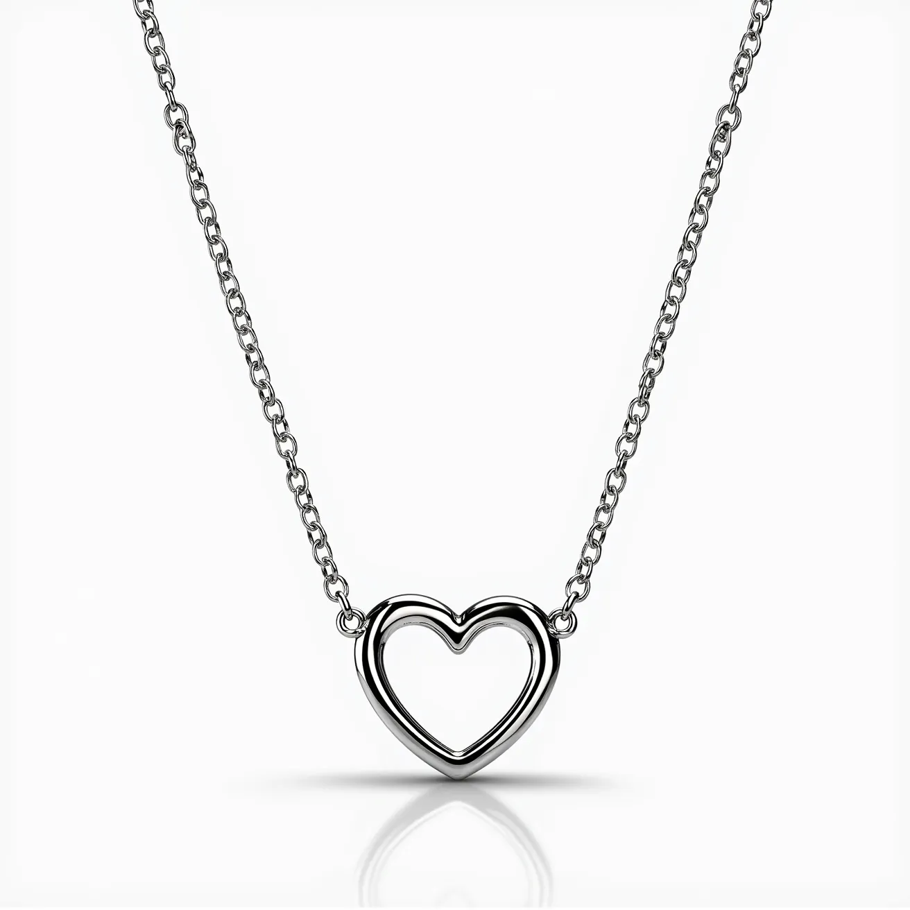 This white gold necklace features a delicate chain with a simple yet elegant heart-shaped pendant. The pendant is an open heart design, crafted entirely from polished white gold, reflecting light beautifully. The chain is composed of small, interconnected links that provide flexibility and comfort, seamlessly connecting to the pendant. The necklace likely includes a classic lobster clasp for secure fastening, complementing its minimalist yet sophisticated style. There are no additional gems or stones, emphasizing the purity and allure of the white gold material.