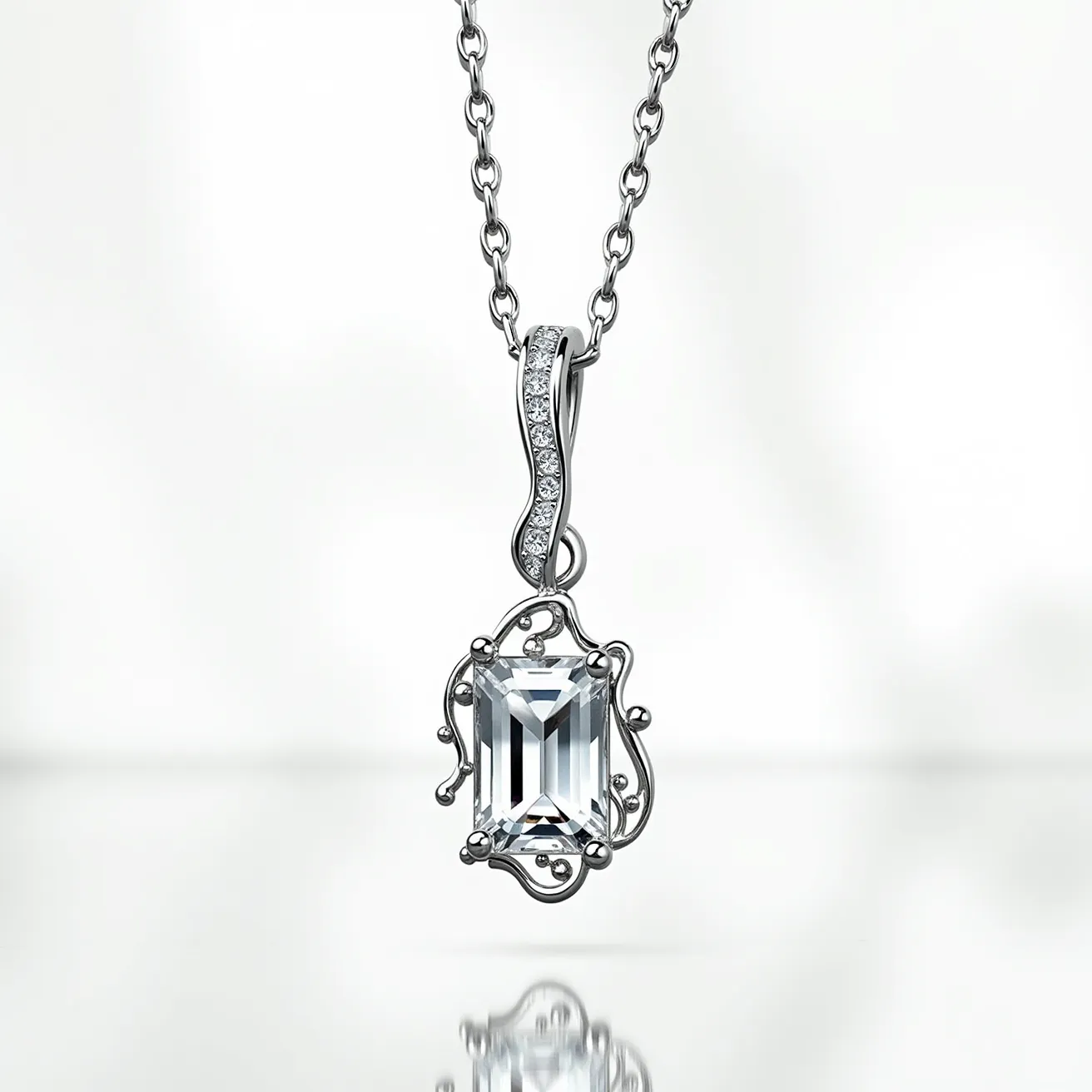 This white sapphire necklace features a striking emerald-cut white sapphire as its centerpiece, elegantly framed by a delicate ornamental metal setting that adds a touch of intricate artistry. The pendant hangs from a polished metal chain, enhancing its sophisticated allure. Above the sapphire, a wavy metal attachment is adorned with a row of small, sparkling stones, possibly diamonds or cubic zirconia, set in a pavé style to maximize brilliance. The necklace is joined by a simple, yet secure, traditional clasp, ensuring both beauty and functionality.