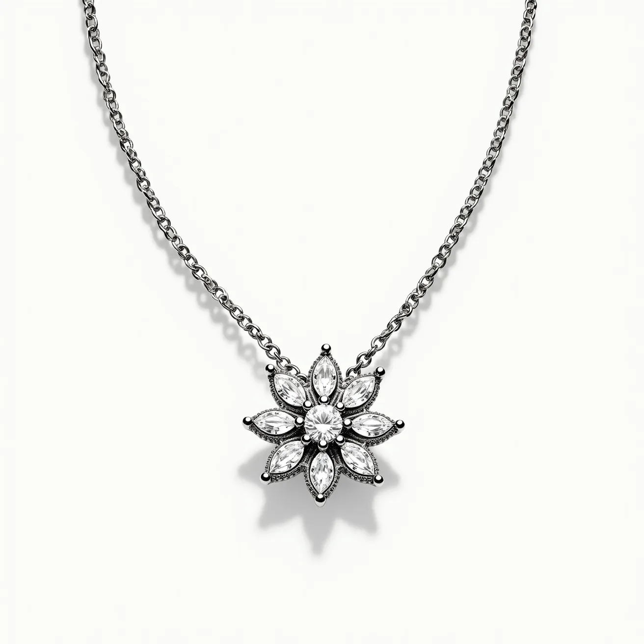 This white sapphire necklace features a stunning flower-shaped pendant with elegantly cut marquise white sapphires arranged as petals around a central round-cut gem. The sapphires are securely held in place by a delicate metal setting, likely sterling silver or white gold, which complements their brilliance. The pendant is suspended from a finely crafted chain, composed of interlinked metal rings, which adds a touch of sophistication. The necklace also includes a sturdy clasp for secure closure, completing its elegant design.