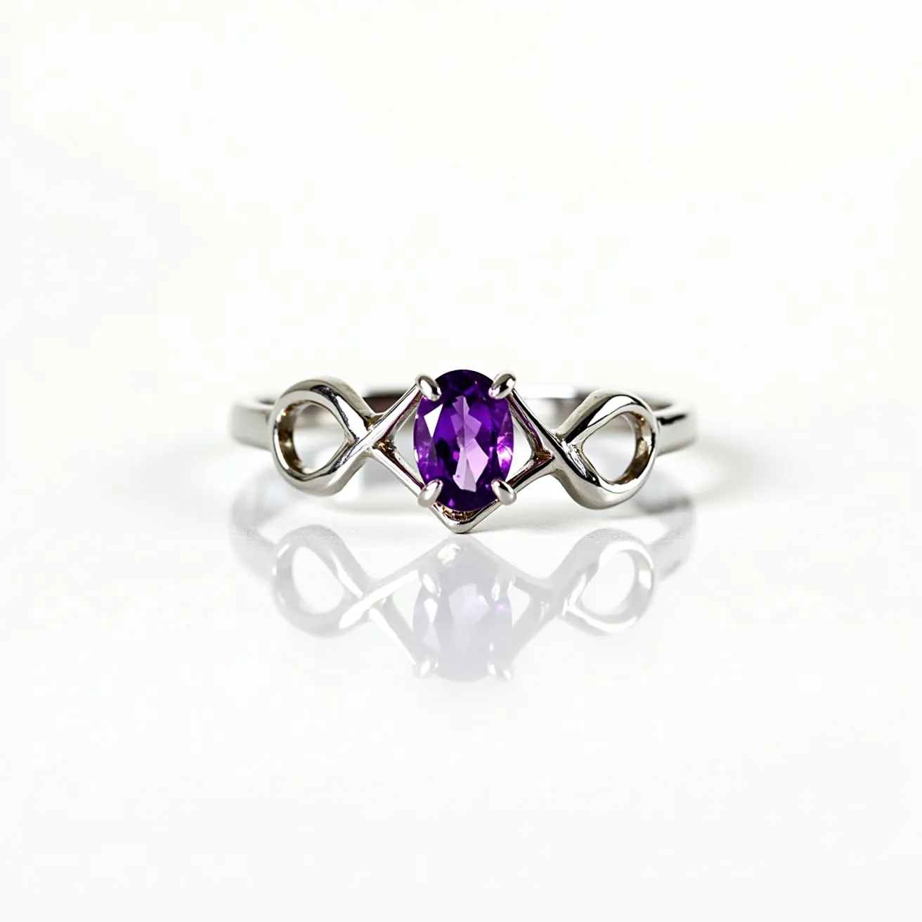 This amethyst promise ring features a beautifully cut oval amethyst stone, which is known for its rich purple hue. The gemstone is set securely within a four-prong setting, allowing the deep color to be prominently displayed. The band of the ring is crafted from a sleek, likely metallic material, such as sterling silver or white gold, and incorporates an elegant infinity design on either side of the central stone. This thoughtful design adds a touch of symbolism, often associated with eternal love and commitment, making it a meaningful piece.