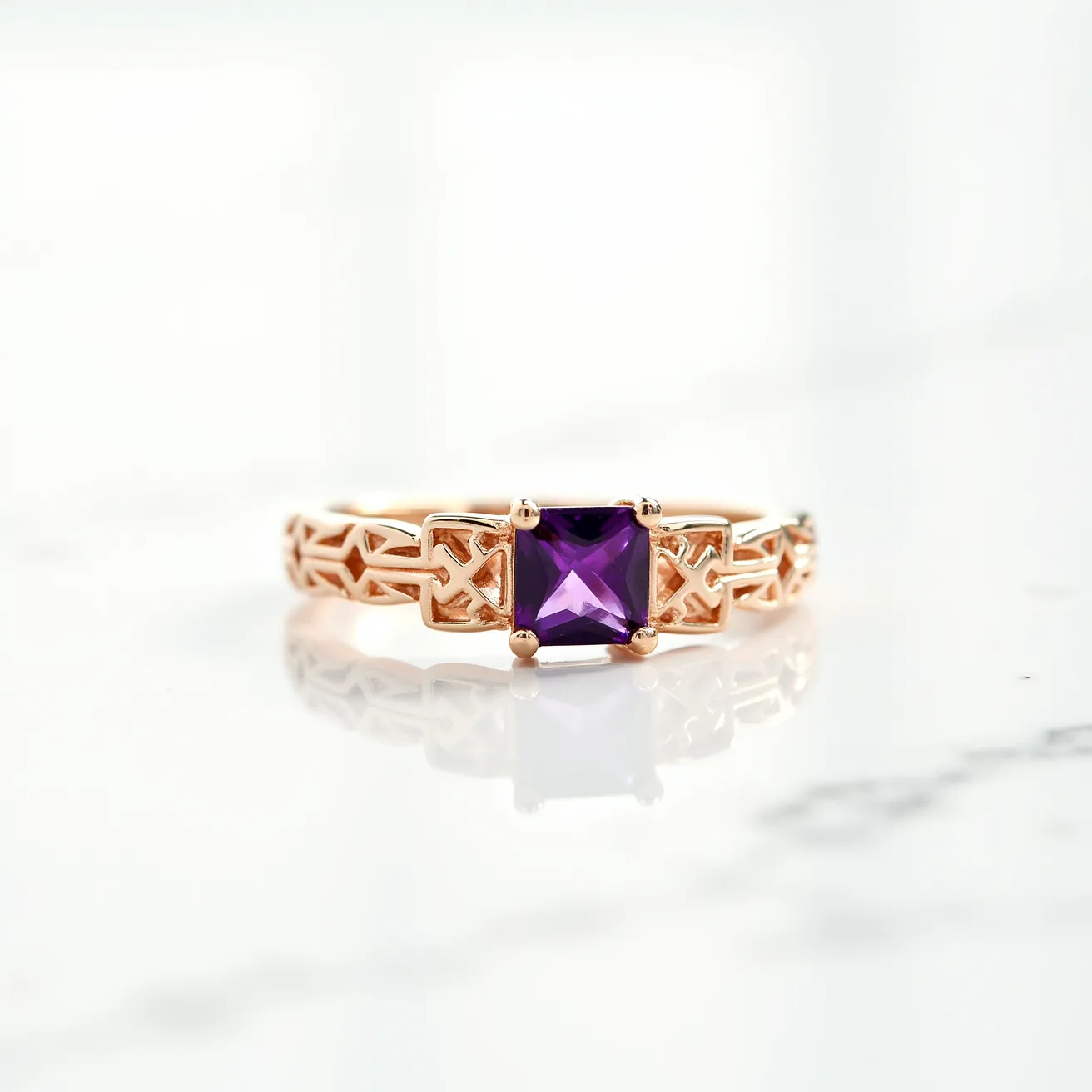 This amethyst promise ring features a square-cut amethyst gemstone set in a prong setting. The band is intricately designed with a rose gold metal, showcasing a detailed, openwork pattern that adds a touch of elegance and uniqueness to the piece. The craftsmanship of the band highlights the contrast with the deep purple of the amethyst, emphasizing the ring's delicate yet striking appearance. This design not only enhances the beauty of the gemstone but also ensures its secure placement, making it a captivating symbol of commitment.