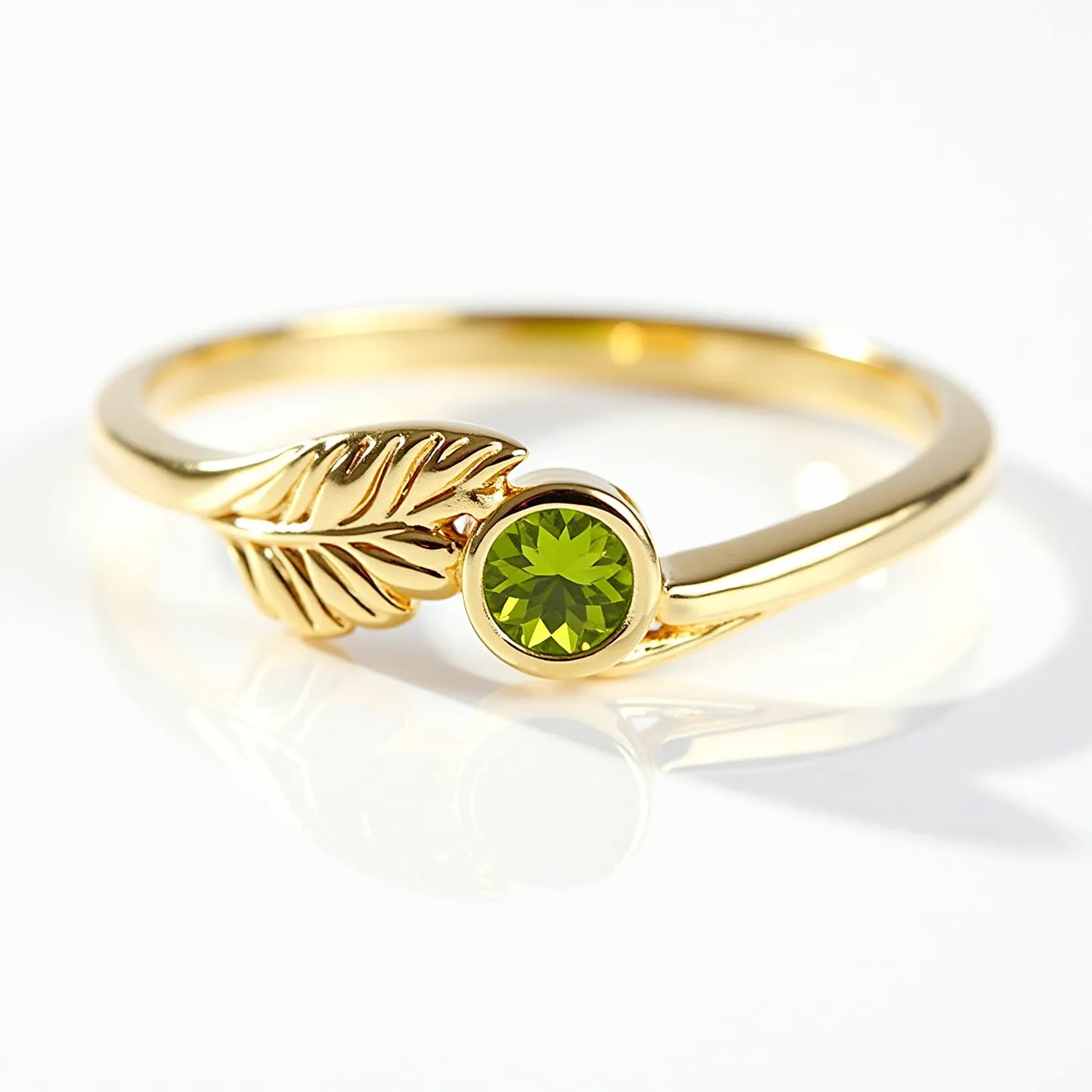 This august birthstone ring features a vivid green peridot, expertly cut in a round brilliant style that catches the light beautifully. The peridot is securely set in a bezel setting, which enhances the ring's sleek and modern design. Crafted in gold, the band is adorned with a delicate leaf motif that elegantly wraps around the gemstone, creating a harmonious blend of natural elements and refined elegance. The gold band complements the peridot’s vibrant hue, making this ring a striking piece that embodies the essence of August's birthstone with grace and subtlety.