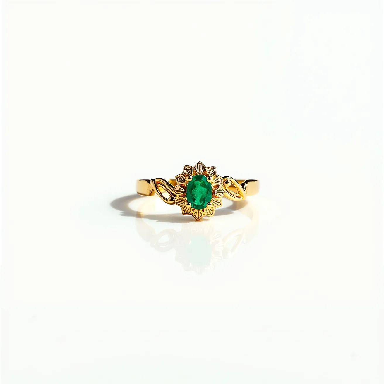 This crown ring features a striking green gemstone, likely an emerald, set at its center. The stone is oval-cut and is surrounded by a detailed gold setting resembling a floral pattern, enhancing the regal and ornate aesthetic. The band is gold, with elegant curves on either side of the central setting, adding a sophisticated touch to the design. The overall appearance emphasizes a delicate yet pronounced elegance, suitable for occasions that call for a statement piece.