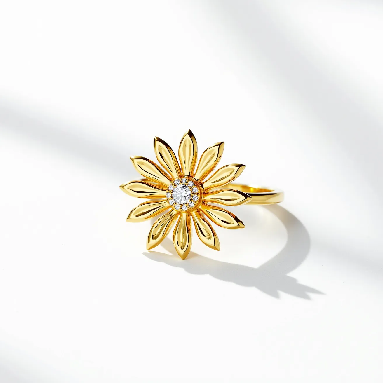 This daisy ring features a gold-toned metal crafted into a delicate flower design with multiple petals radiating outward. At the center, a round brilliant-cut diamond is set, surrounded by smaller diamonds that form a halo, enhancing its brilliance. The petals have a smooth and polished finish, adding to the ring's elegant appearance. The shank is simple, with a smooth texture that complements the intricate floral motif. There is no visible clasp or attachment, as the ring appears to be a continuous band designed for finger wear.