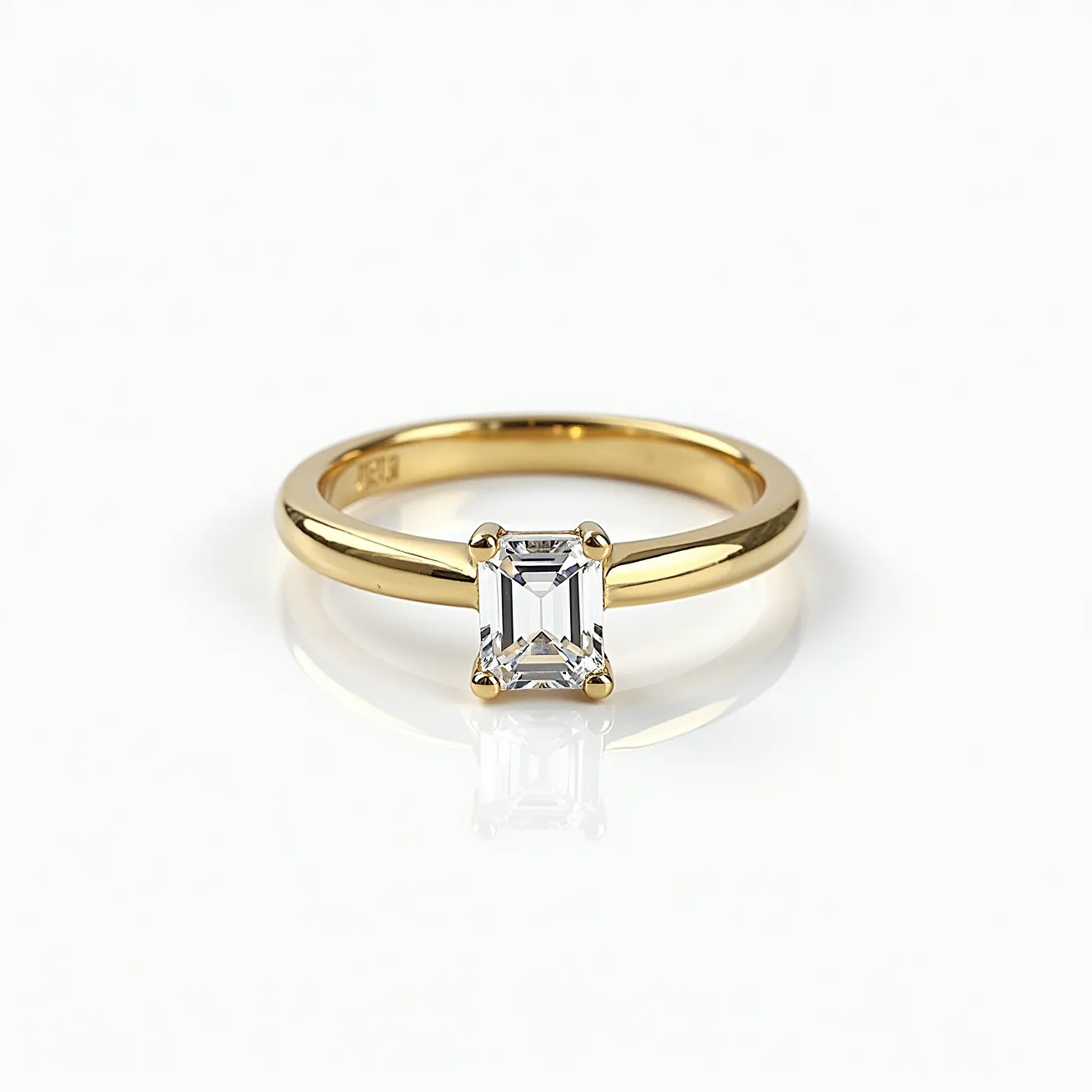 This diamond wedding band features a sleek, polished yellow gold band that elegantly supports a central emerald-cut diamond. The diamond is securely held in place by a classic prong setting, allowing maximum light to enhance its brilliance. The yellow gold band complements the diamond’s clarity and rectangular shape, creating a timeless and sophisticated aesthetic. This design showcases a harmonious blend of precious metal and gemstone, perfect for a symbol of lasting commitment.