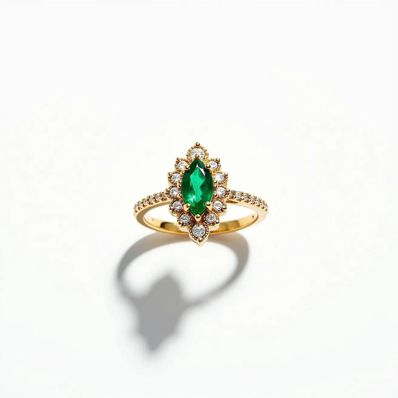 This emerald birthstone ring features a striking marquise-cut emerald at its center, elegantly encircled by a halo of smaller round diamonds. The setting is crafted in a gold band, which is adorned with additional small diamonds, enhancing the ring's opulence and brilliance. The prong setting securely holds the emerald and each of the smaller diamonds, ensuring both visibility and security. The contrast between the deep green of the emerald and the sparkling white diamonds creates a timeless and luxurious appearance, making this ring a captivating piece of jewelry.