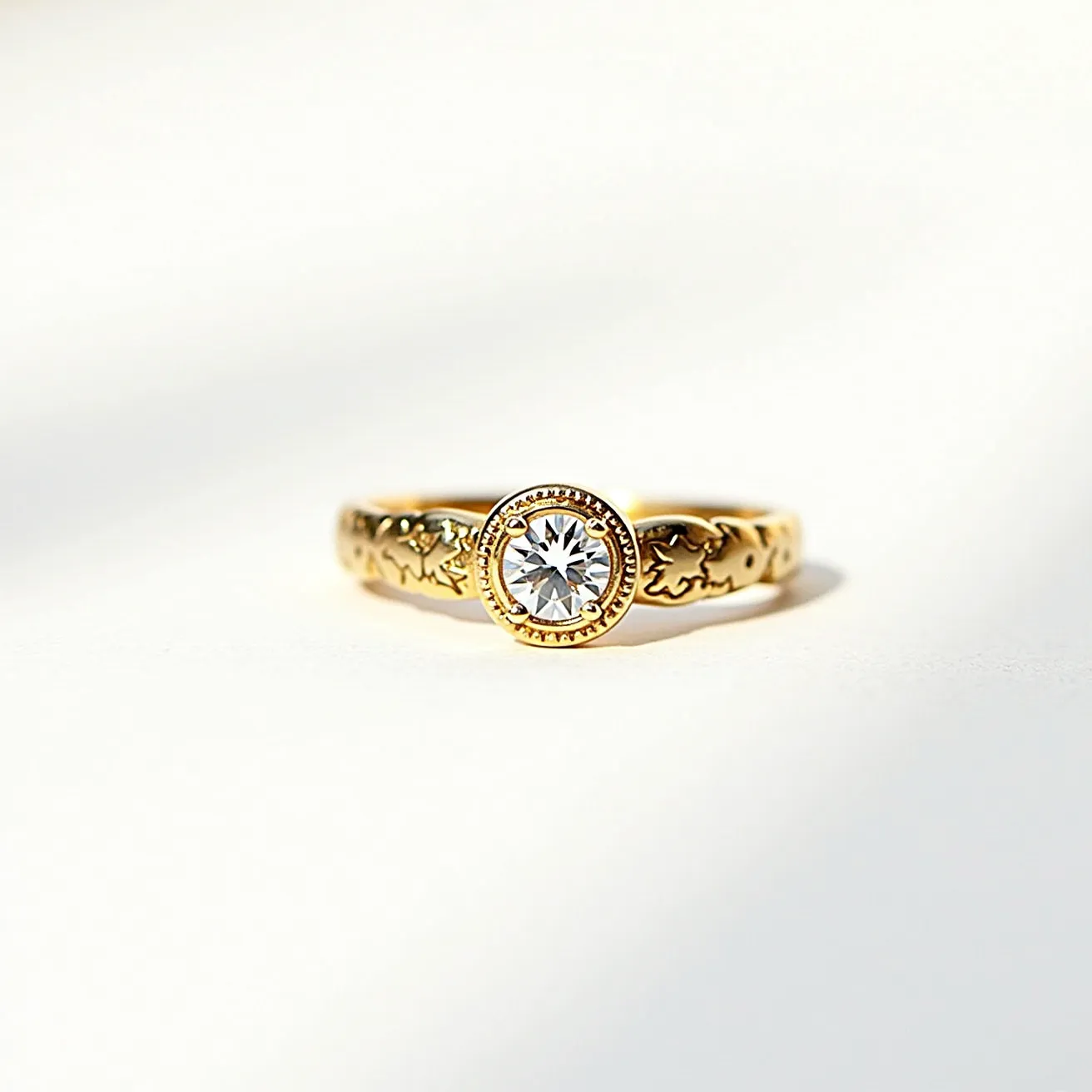 This engraved ring features a vibrant gold band adorned with intricate floral engravings that add an elegant touch to its design. The central focus of the ring is a round-cut gemstone, likely a diamond, set prominently within a bezel setting that securely encircles the stone. This setting enhances the stone’s brilliance while providing a sleek, polished silhouette. The gold metal complements the sparkle of the gemstone, creating a harmonious and timeless piece of jewelry.