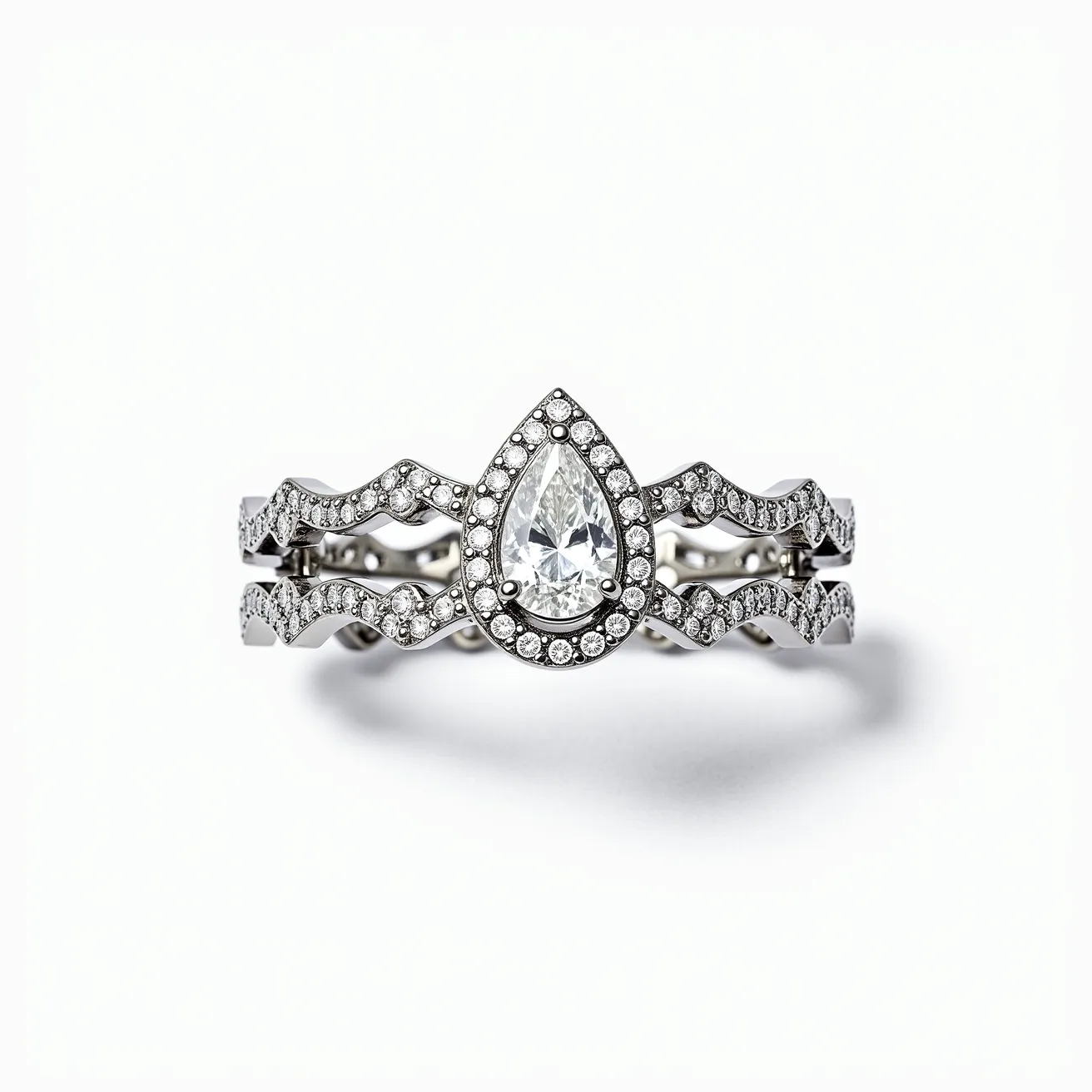 This eternity ring is a stunning piece featuring a central pear-shaped diamond, prominently displayed in a halo setting that amplifies its brilliance. Surrounding the center gemstone are several smaller round diamonds, meticulously arranged within an intricate, scalloped design of the band, further enhancing its elegance. The band is crafted from a lustrous metal, likely platinum or white gold, which complements the sparkle of the diamonds beautifully. The absence of a clasp solidifies its identity as an eternity ring, symbolizing endless love and unbroken commitment, making it both a luxurious and meaningful piece of jewelry.