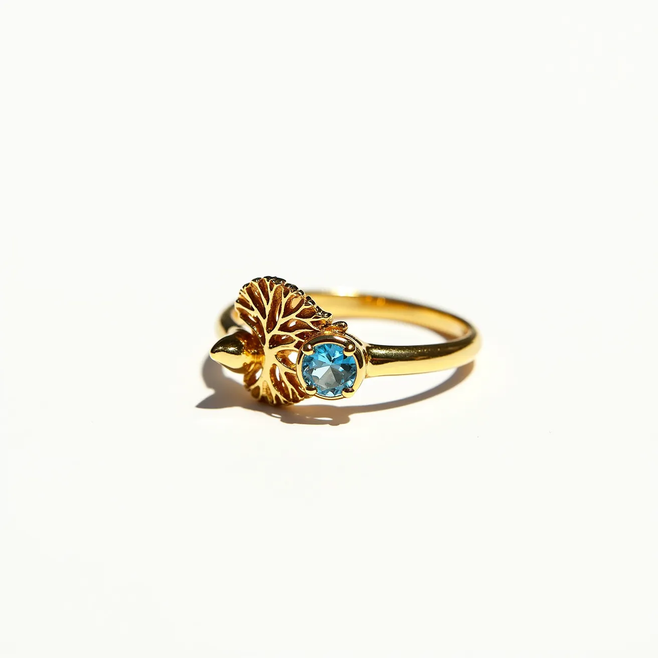 This floral ring features a delicate gold band that elegantly wraps around the finger, culminating in a beautifully crafted floral motif. At the heart of this design is a striking blue gemstone, likely a blue topaz, cut with facets that catch the light impressively. The gem is securely set in a prong setting, emphasizing the stone while ensuring stability and durability. The gold floral pattern beside the gemstone adds a layer of sophisticated detail, highlighting the natural theme of the ring. This combination of gold and blue makes for a visually stunning piece that balances elegance with artistry.