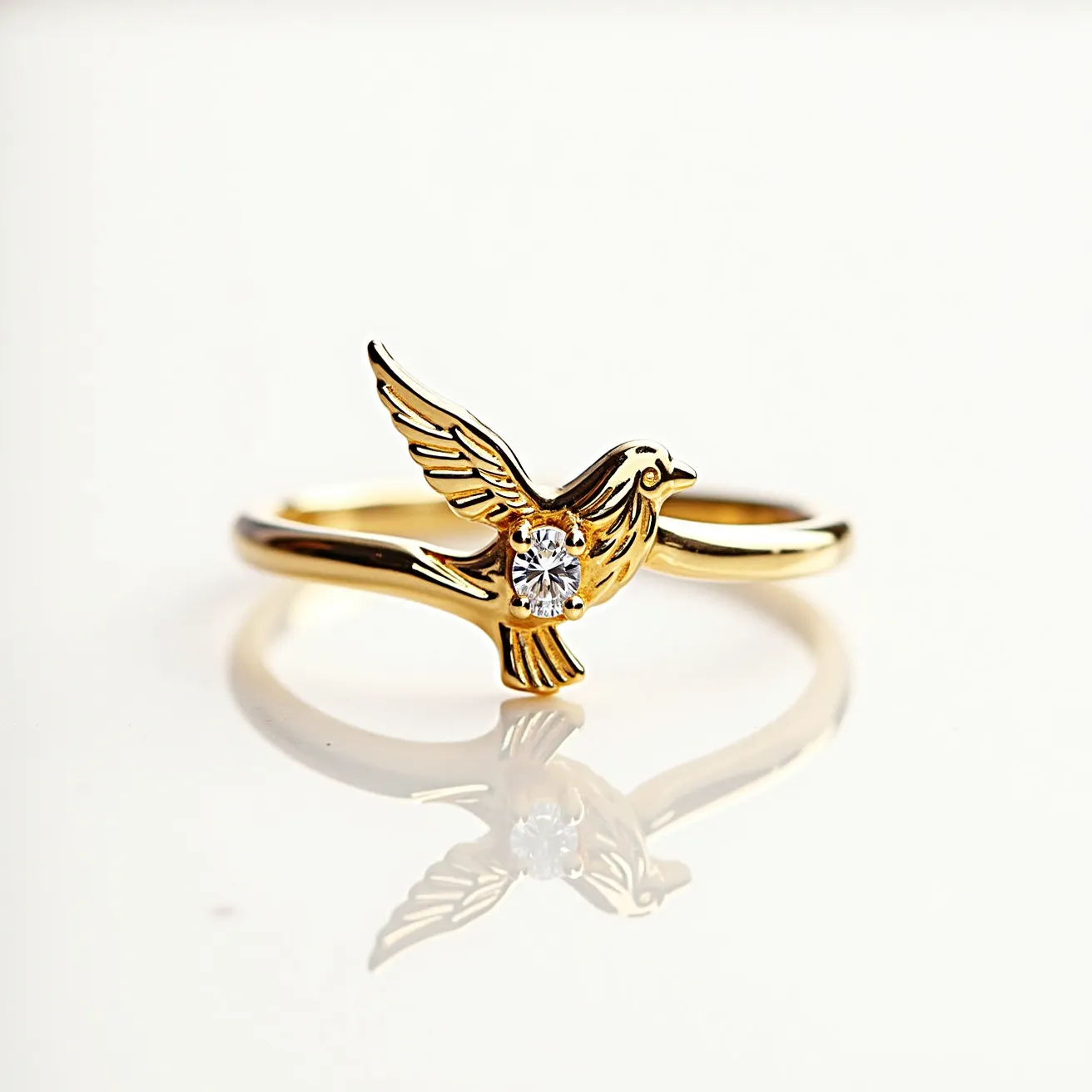 This golden bird ring showcases an elegant and sleek design crafted from polished gold, forming the graceful silhouette of a bird in flight. At the heart of the bird's body, a single round-cut diamond is securely set, adding a touch of sparkle and sophistication to the piece. The diamond appears to be held in place by a classic prong setting, ensuring it catches light from multiple angles, enhancing its brilliance. The band of the ring is smooth and minimalistic, drawing attention to the bird and diamond centerpiece. The combination of gold and diamond enhances the ring’s luxurious appearance, creating a striking piece of jewelry.