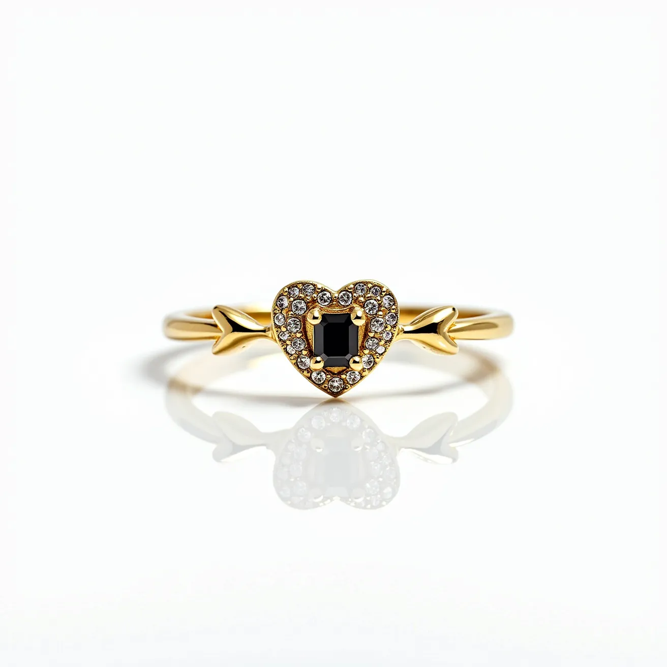 This heart ring features a gold band with a charming heart design at its center. The heart shape is bordered by small, round-cut clear stones in a pave setting, adding a sparkling touch. At the center of the heart, there is a square-cut black stone set in a secure prong setting. Additionally, the band is adorned with small arrow designs on either side of the heart, enhancing its playful and romantic theme.