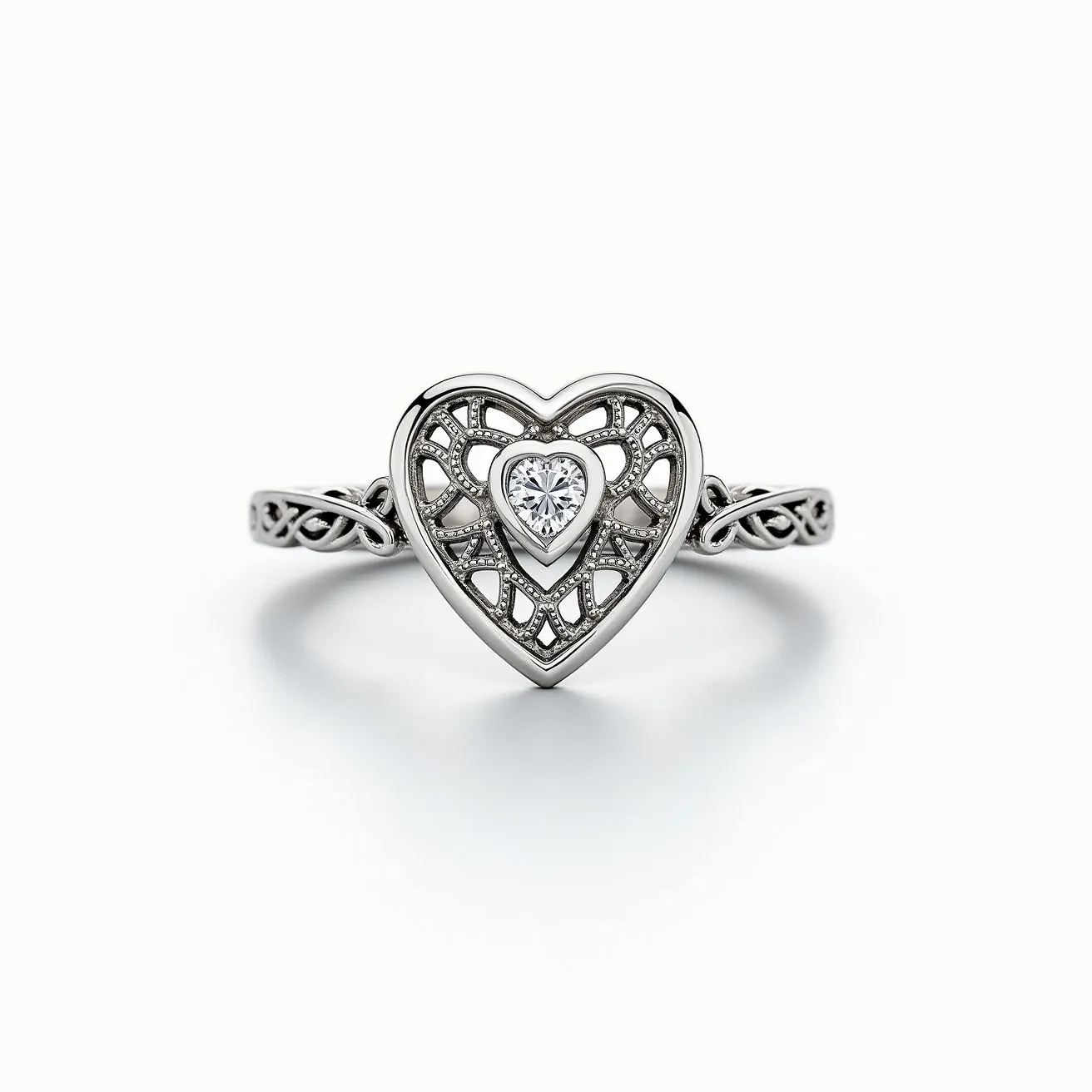 This heart wedding ring features an exquisite design crafted from a beautiful silvery-white metal, likely platinum or white gold. At its center is a sparkling heart-cut diamond, intricately set within the open heart framework, showcasing a prong setting that securely holds the gem in place. The ring's band carries an elegant filigree motif, adding a touch of vintage charm to the overall design, while seamlessly integrating with the heart centerpiece. The detailing around the gemstone and the filigree work highlights the craftsmanship, making this piece both delicate and striking, perfect for a timeless wedding symbol.