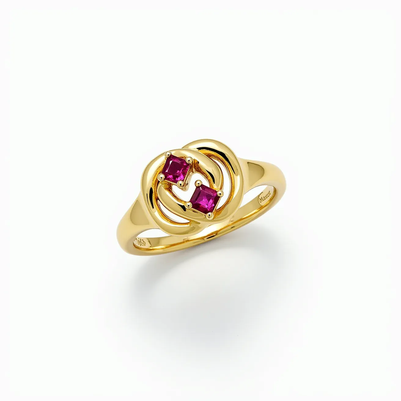 This knot ring features an elegant design crafted from yellow gold, forming an intricate knot pattern. It is adorned with two striking square-cut red gemstones, likely rubies, which are set in the center of the knot. The stones are secured with prong settings that complement the overall aesthetic of the ring. The gold band is smooth and polished, providing a luxurious finish to the piece. The combination of gold and vibrant gemstones creates a classic and sophisticated look.