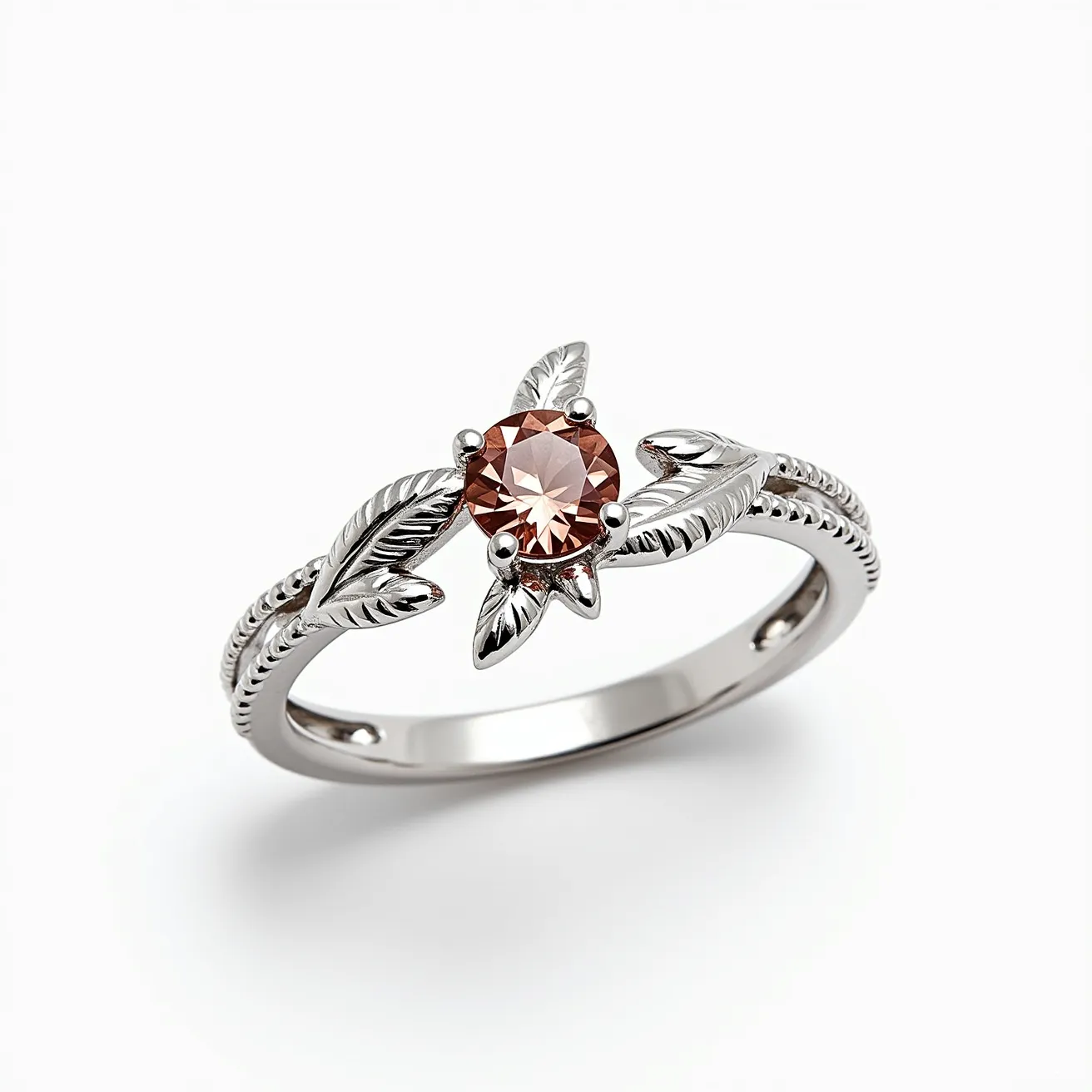 This love ring features a delicate band crafted from a sleek, silver-toned metal that intricately incorporates leaf motifs along its design. At the center, a single, round-cut gemstone is set in a classic prong setting, drawing attention with its rich, warm brown hue. The leaf details on either side of the gem add a nature-inspired elegance, complementing the central stone beautifully. The design of the band showcases fine craftsmanship, enhancing the overall aesthetic of this romantic piece.