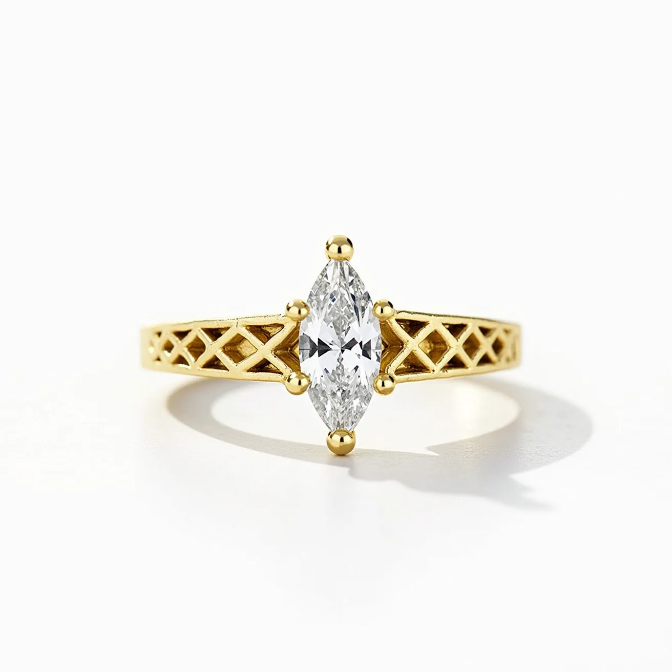 This marquise engagement ring features a central marquise-cut diamond, elegantly set in a prong setting secured by four gold prongs at the top and bottom. The stone's elongated shape adds a touch of sophistication and brilliance, emphasizing its clarity and elegance. The ring is crafted from yellow gold, which enhances its luxurious appearance and complements the diamond's sparkle. The band showcases a distinctive open lattice design, adding an element of intricate detail and visual interest. The combination of the marquise diamond and the ornate band makes this ring a striking symbol of elegance and style.