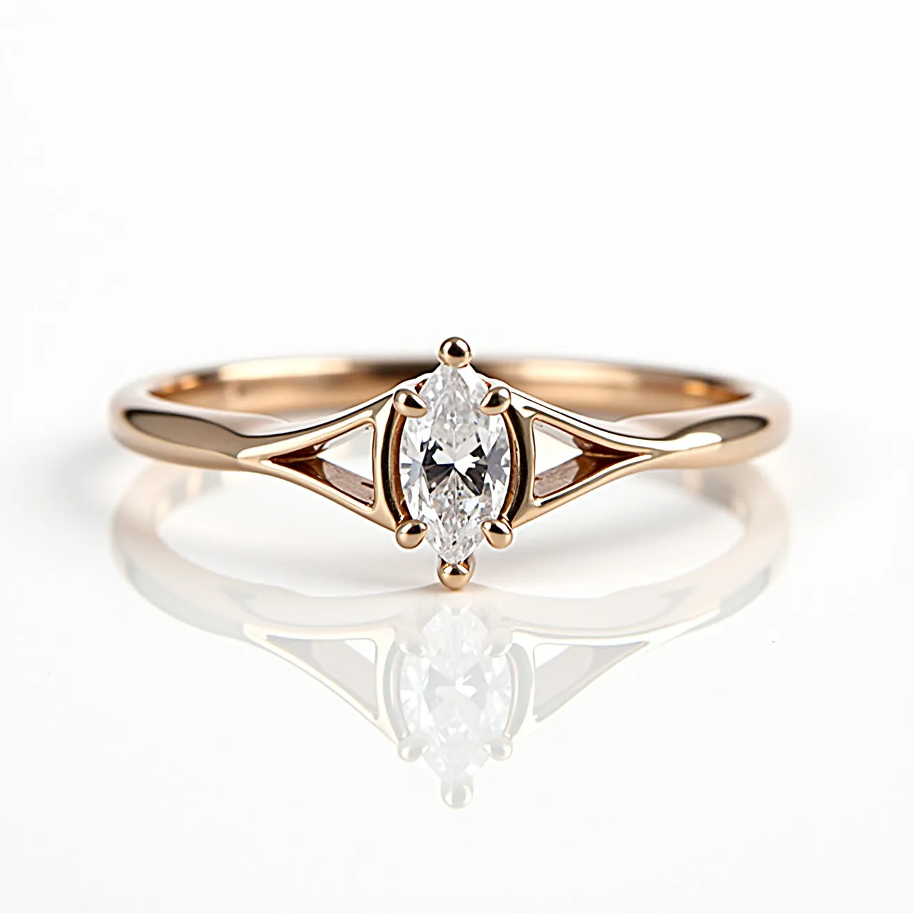 This marquise engagement ring features a central marquise-cut diamond, set in a sleek and elegant design. The stone is held securely by four prongs, enhancing its shape and brilliance. The band is crafted from polished rose gold, which complements the sparkle of the diamond beautifully. Flanking the center stone on either side are two openwork design elements that add a modern touch to the classic silhouette. The band tapers gently as it approaches the stone, creating an elegant and cohesive look that highlights the gemstone's elongated shape.