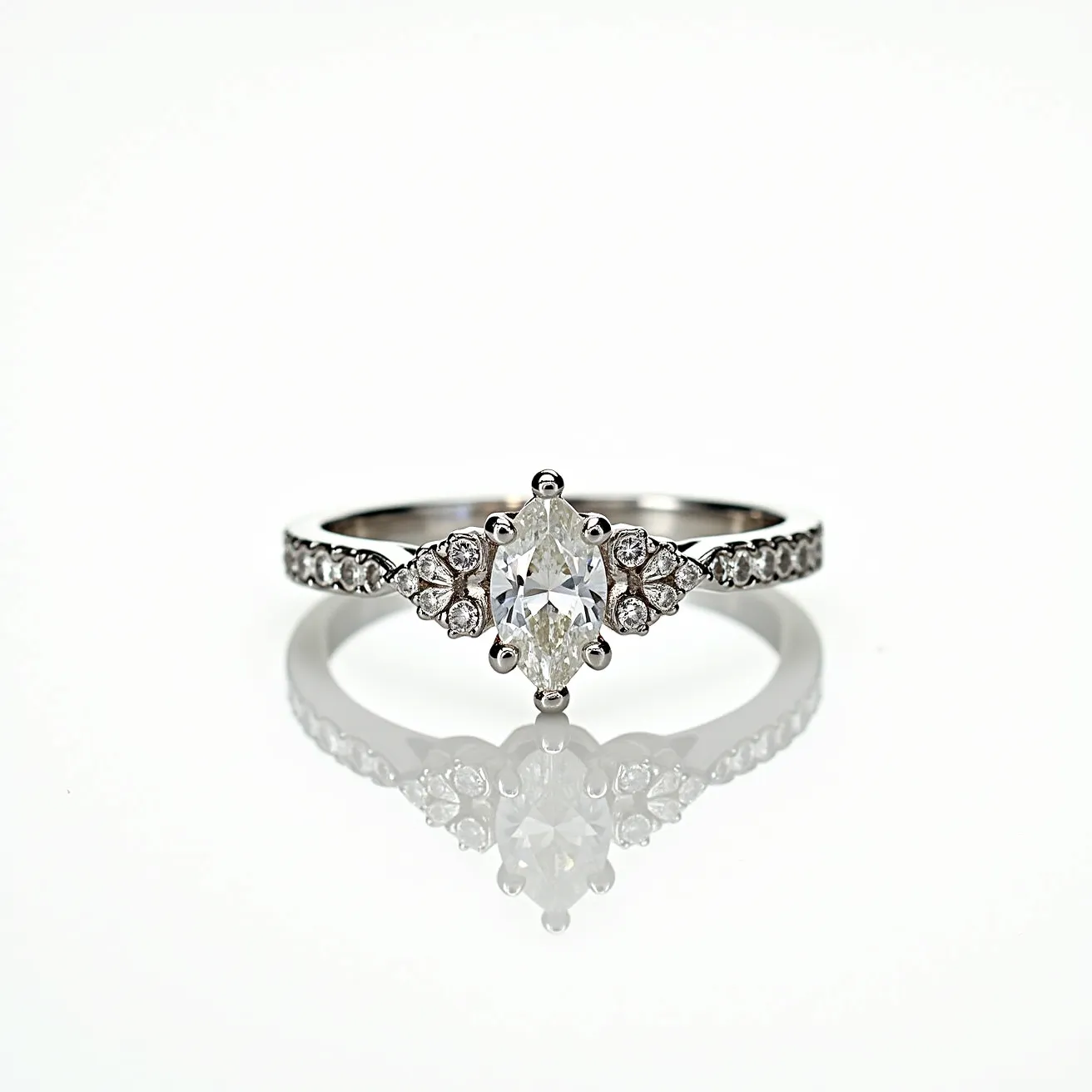 This marquise engagement ring features a central marquise-cut diamond elegantly set with six prongs, showcasing its elongated, elegant shape. Flanking the central stone are clusters of smaller round diamonds, adding to the ring's brilliance and luxury. The band is crafted from a lustrous metal, likely white gold or platinum, and is further accentuated by a row of pave-set diamonds, enhancing the overall sparkle and sophistication. The prongs and settings are intricately designed to hold the stones securely, highlighting the craftsmanship involved in this exquisite piece.