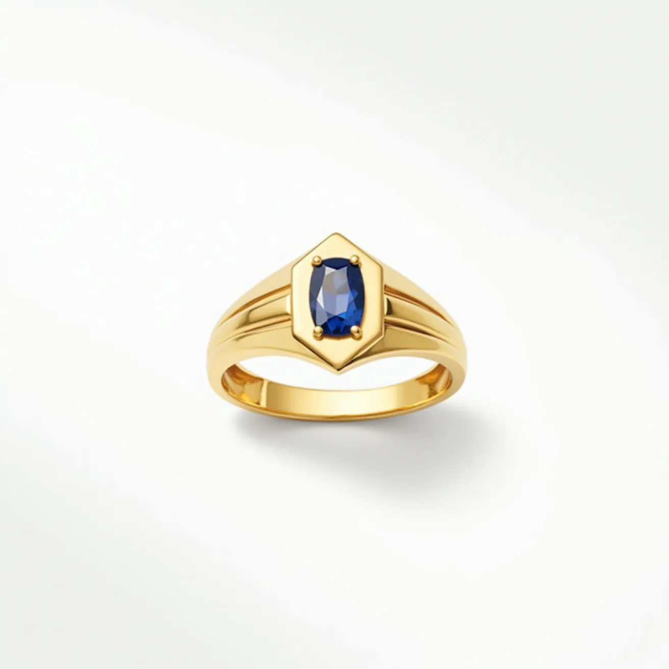 This men's pinky ring features a sleek gold band that exudes a sense of elegance and luxury. At the heart of the ring is a striking blue gemstone, likely a sapphire, cut into an elongated hexagonal shape. The stone is securely set within a bezel setting, which both protects the gem and enhances its deep color. The design is minimal yet sophisticated, making it a timeless piece for any gentleman's collection.