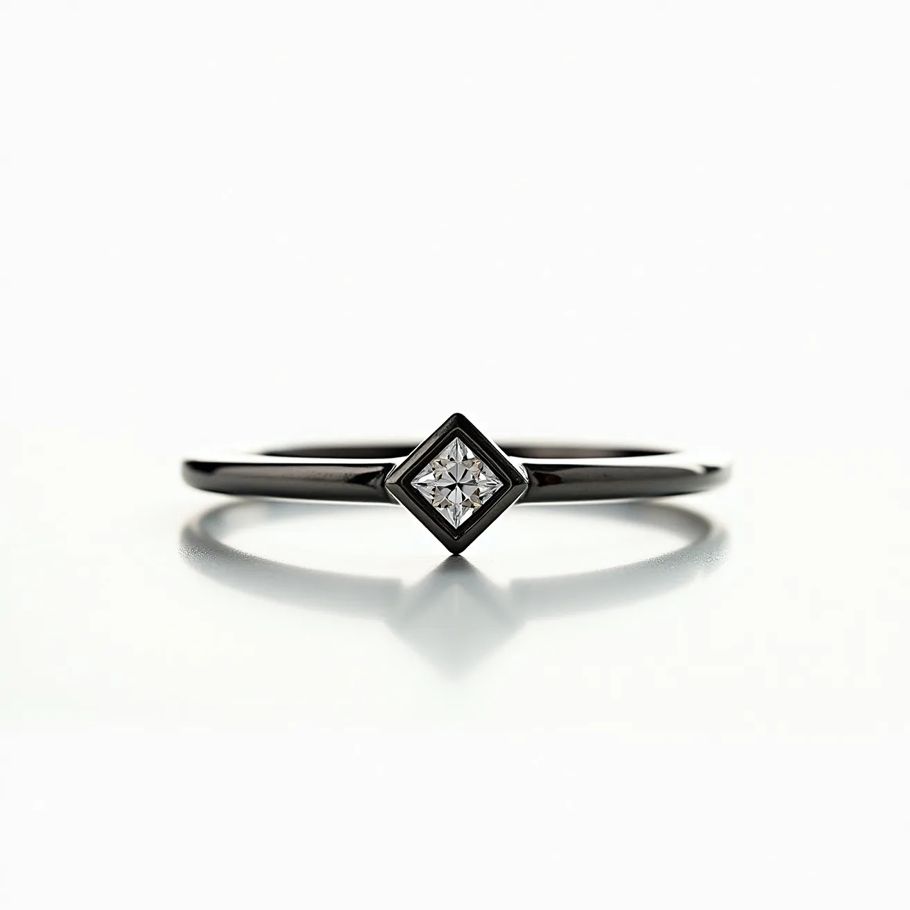 This men's ring features a sleek band crafted from a dark, possibly black metal that provides a modern and sophisticated look. The centerpiece of the ring is a small, square-cut diamond, which is securely set within a bezel setting, adding both elegance and durability. The combination of the dark metal and the sparkling diamond creates a striking contrast, enhancing the overall design of the ring. The simplicity and refined style of the ring make it suitable for both formal and casual occasions.