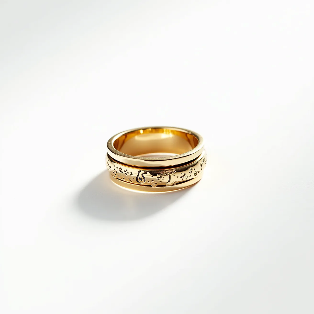 This men's spinner ring features a gold finish with a polished inner band and a detailed outer band that spins independently. The outer band is intricately engraved with symbols and patterns that enhance its visual appeal. There are no gems or stones embedded in the design, maintaining a sleek and minimalist look. The ring does not have any clasps or additional attachments, allowing for a smooth and continuous surface that highlights the craftsmanship and unique spinning function of the outer band.