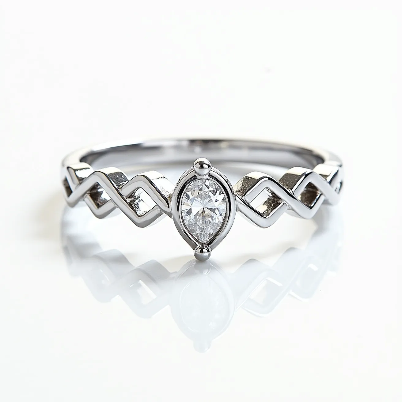 This mothers ring features a striking design crafted from a shiny metal, likely silver or white gold, with an elegant, interlocking wave pattern along the band. At its center is a marquise-cut diamond set in a bezel, highlighting the stone's elongated shape and brilliance. The setting is secure, offering both protection and prominence to the central gem. The intricate band design adds a unique, personal touch to the ring's overall aesthetic.