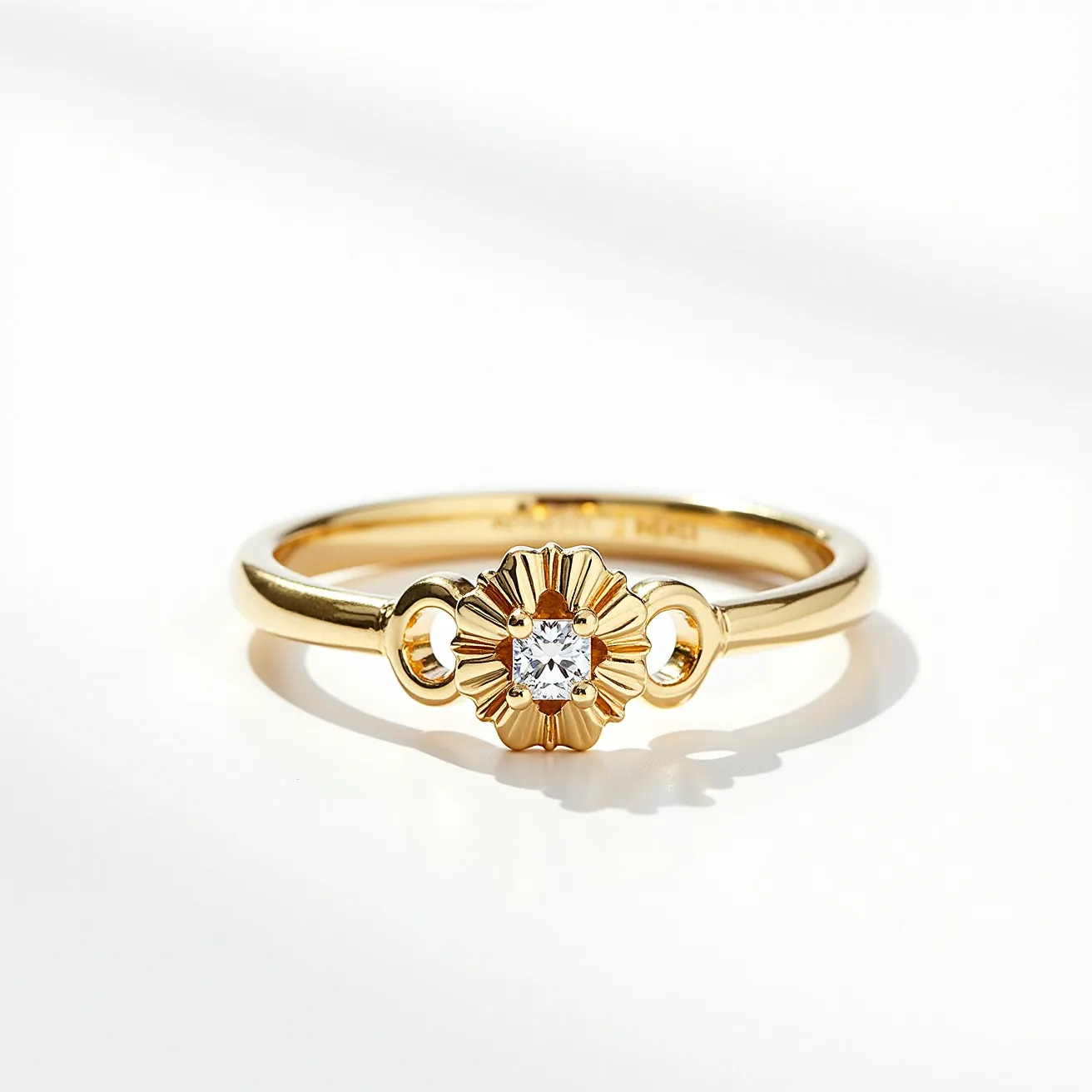 This mother's ring is crafted from a polished yellow gold band, featuring a central stone that appears to be a clear, faceted gemstone, possibly a diamond, set in a floral-inspired setting. The gemstone is cut in a classic round shape, enhancing its brilliance and adding a timeless elegance to the piece. The ring displays intricate detailing around the stone, with a radiant pattern that enhances its central position and draws focus to the gem. Flanking the floral design are small, delicate loops that add additional charm and flow to the design. The harmonious combination of elements makes this ring a beautiful and meaningful symbol of familial connection and love.