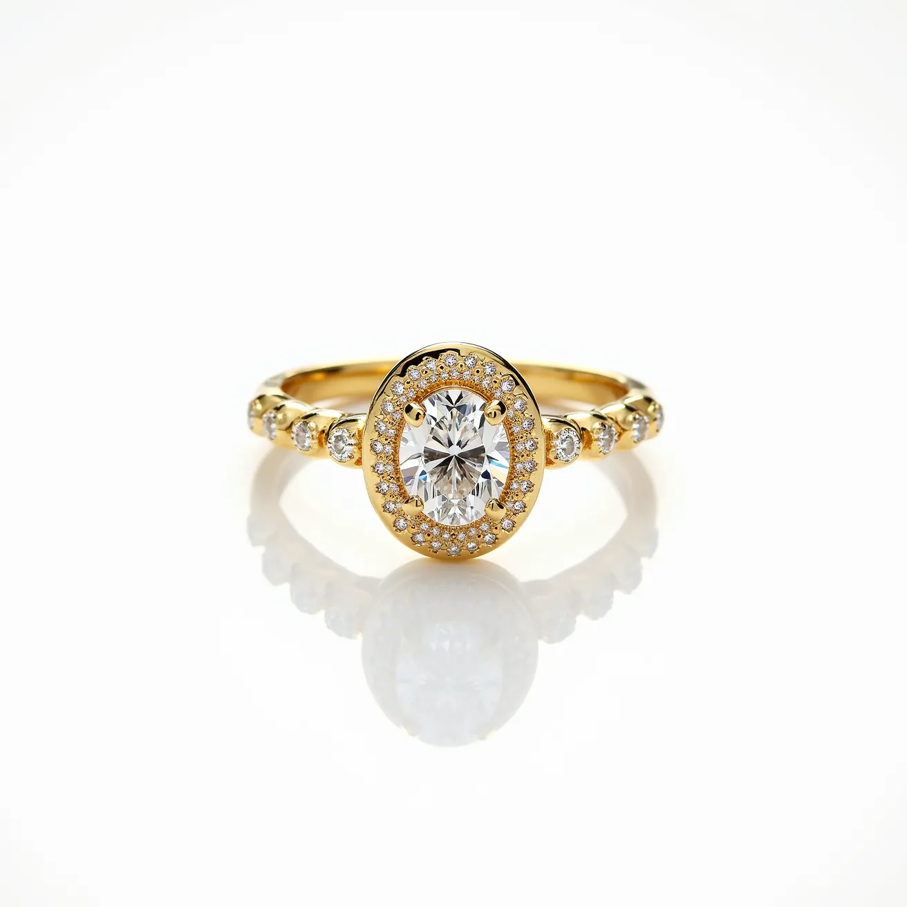 This oval diamond ring showcases a stunning central oval-cut diamond, elegantly set in a four-prong gold setting. The band is crafted from a warm yellow gold, complementing the brilliance of the diamond. Surrounding the main stone is a halo of smaller round diamonds, enhancing the ring's sparkle and drawing attention to the central gem. Along the band, additional small round diamonds continue the theme of elegance, each securely held in place by a bezel setting, adding to the ring's refined design.