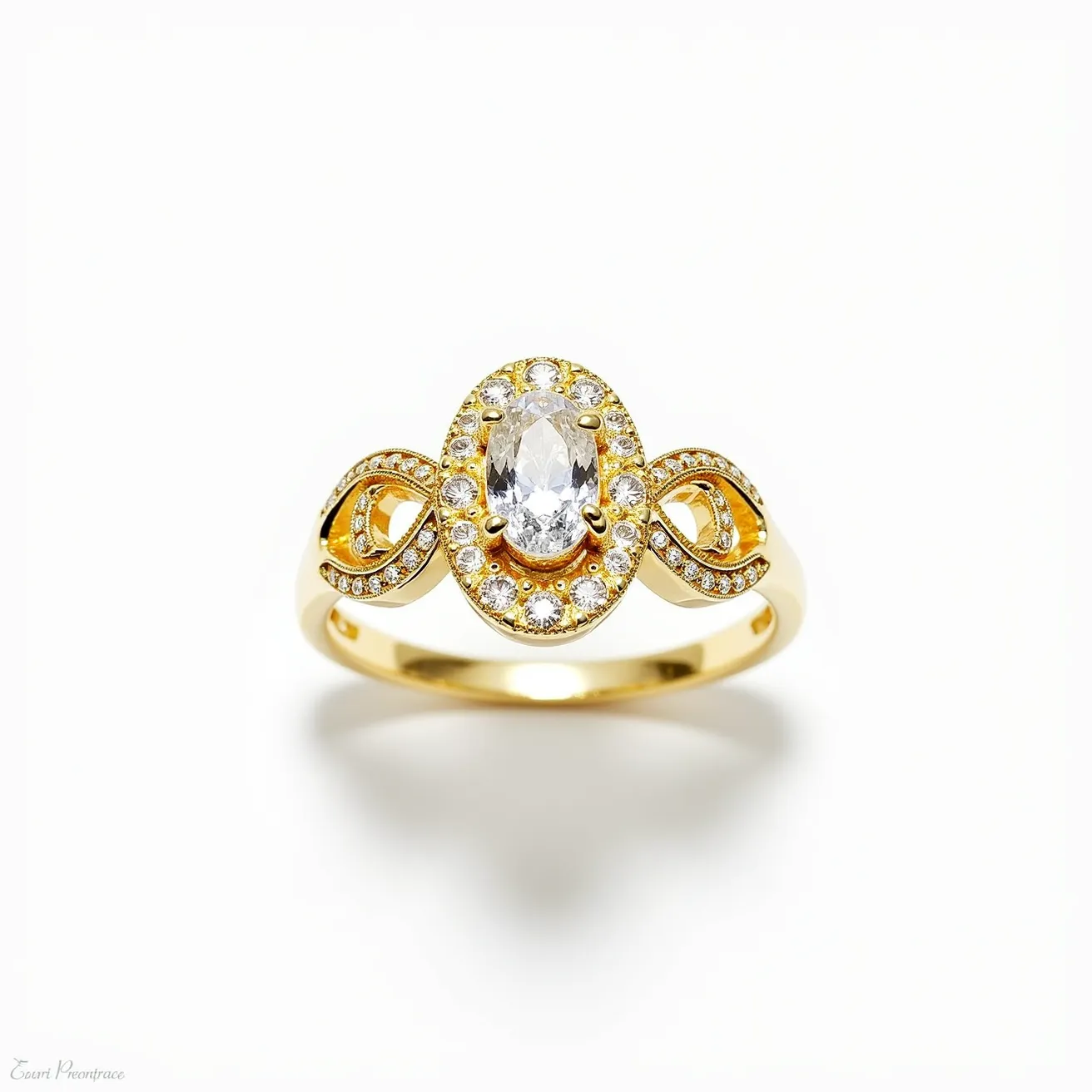 This oval diamond ring features a central oval-cut diamond set in a halo of smaller round diamonds, which enhances its brilliance. The band, crafted from yellow gold, showcases intricate detailing with intertwining loops on each side of the central setting, each adorned with additional smaller diamonds. The delicate arrangement of the stones and the elegant gold design create a striking, luxurious appearance. The diamond is securely set in a prong setting, ensuring both stability and prominence.