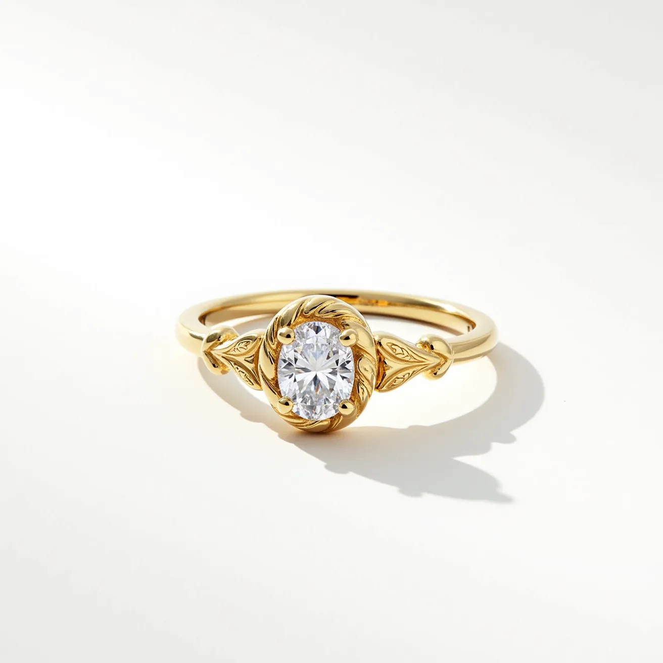 This oval engagement ring features a dazzling oval-cut diamond at its center, elegantly set in a four-prong setting that highlights its brilliance. The band is crafted from gold, providing a warm and luxurious backdrop to the central stone. Intricate detailing surrounds the diamond, adding an element of sophistication and uniqueness to the design. The simplicity and elegance of the band enhance the overall allure of the ring, making it a timeless piece suitable for any engagement occasion.