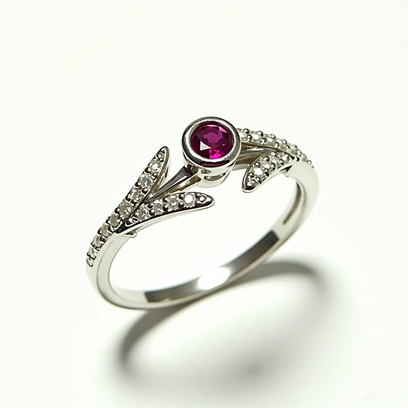 This pave diamond ring features a delicate and elegant design, crafted from what appears to be white gold or platinum. The ring is adorned with a central round-cut pink gemstone, likely a ruby or sapphire, set in a bezel setting. Surrounding the central stone are pavé-set small diamonds that extend along the band, enhancing its sparkle and creating a sophisticated visual appeal. The intricate arrangement of the small diamonds in the pave setting complements the central stone beautifully. The ring's band is sleek and smooth, ensuring a comfortable fit for the wearer.