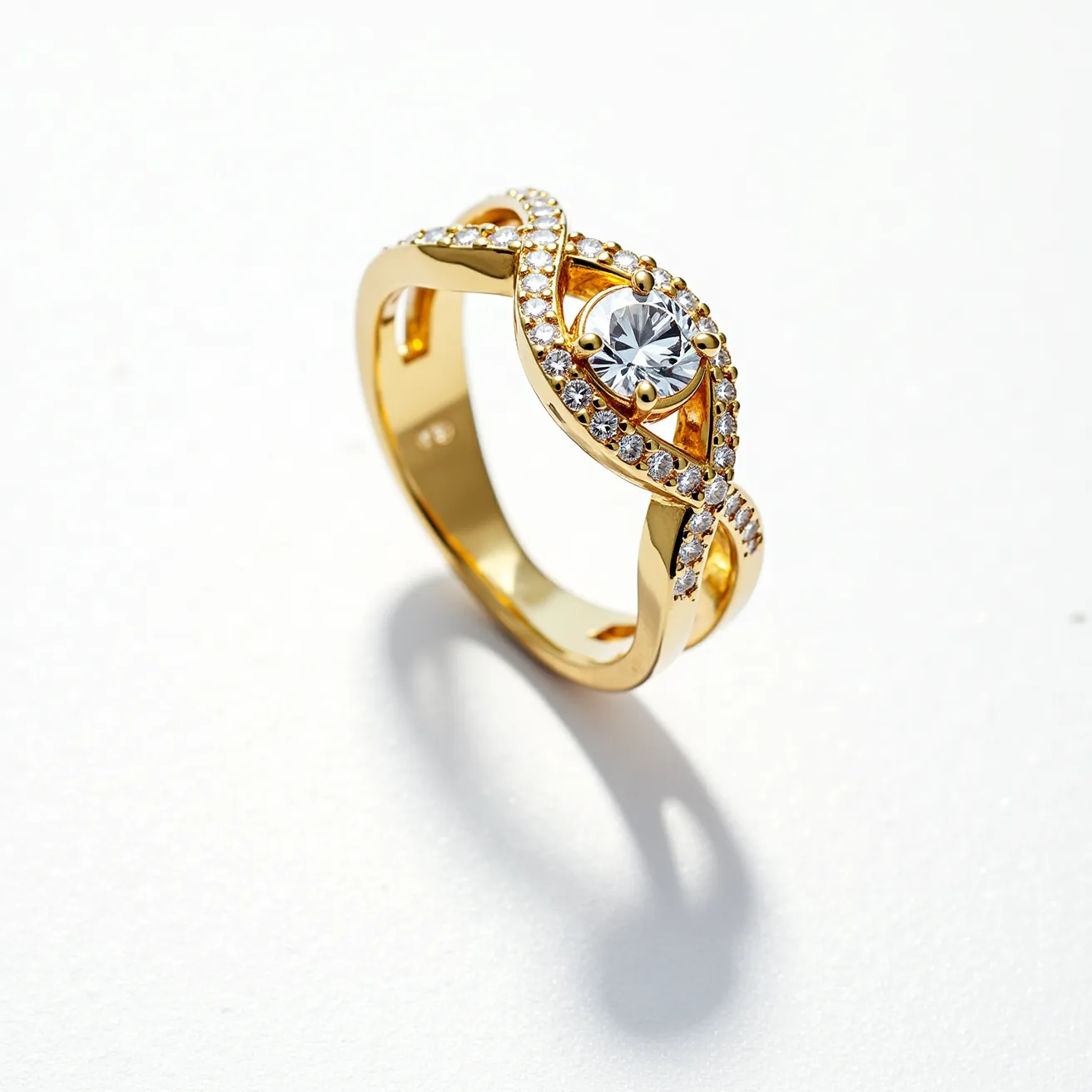 This pave ring features a gold band intricately designed with an infinity motif, encrusted with small round clear stones in a pave setting that add a continuous sparkle throughout the design. At its centerpiece, the ring displays a larger round-cut stone, securely held in a four-prong setting, which acts as a focal point of brilliance. The pave stones are meticulously set along the looped design, enhancing the ring's luxurious appearance. The band is smoothly polished, complementing the overall elegance and timeless style of the piece.