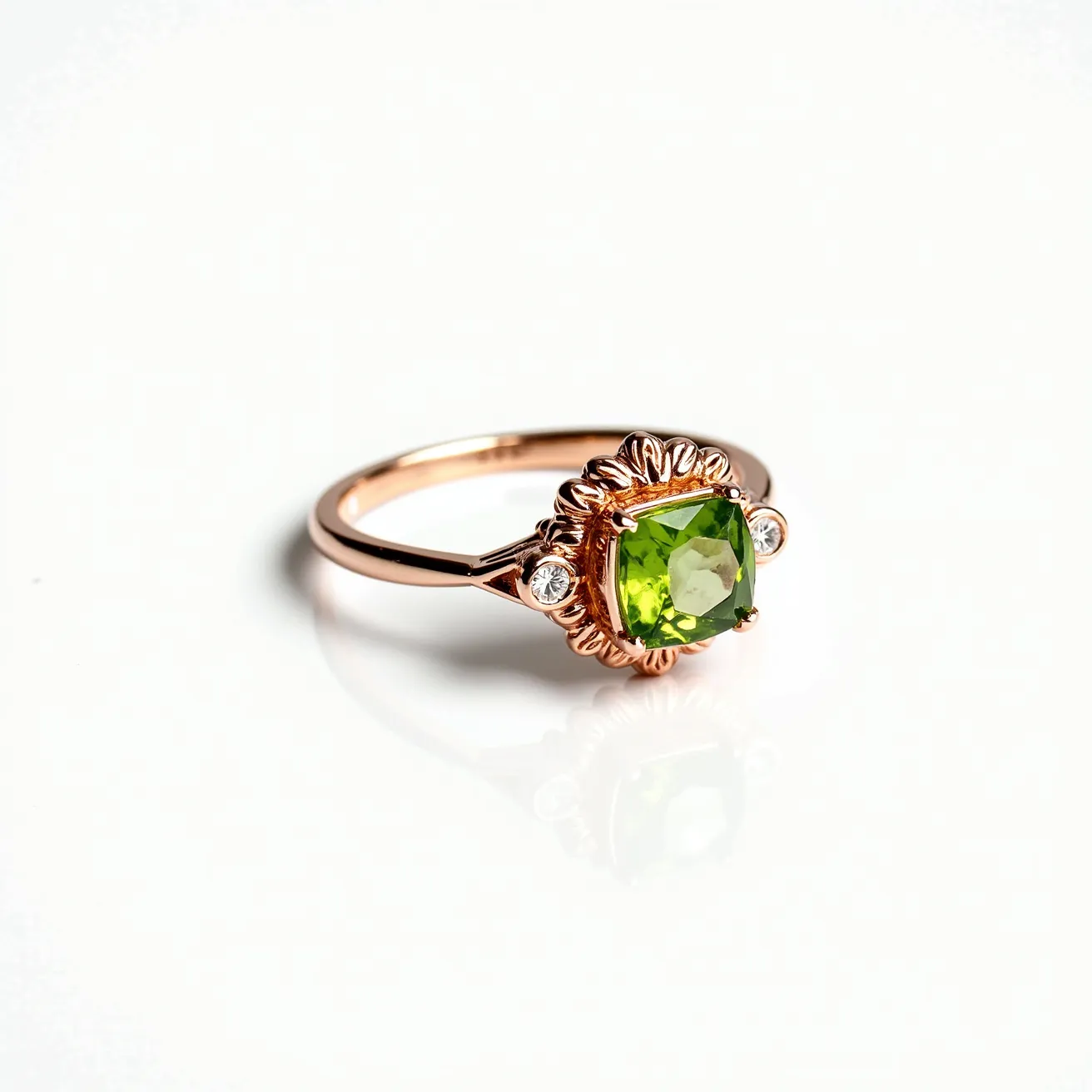 This peridot engagement ring features a stunning, square-cut peridot as its centerpiece, highlighted by its vibrant green hue. The peridot is set in a rose gold band, bringing warmth and elegance to the overall design. Surrounding the central gem, the ring is adorned with intricate detailing that frames the peridot beautifully. Additionally, two small round diamonds flank the peridot on either side, adding a touch of sparkle and contrast. The combination of these elements creates a harmonious and eye-catching piece perfect for a unique engagement ring.