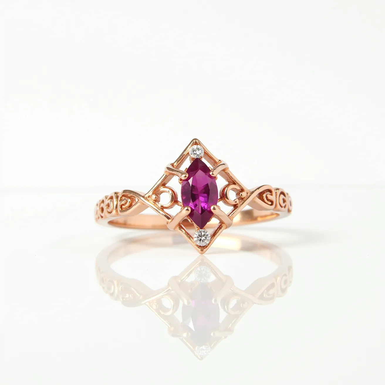 This pink sapphire ring features a marquise-cut pink sapphire as the centerpiece, elegantly set within a rose gold band. The marquise cut enhances the stone’s brilliance, giving it an elongated and symmetrical shape that draws attention. The sapphire is held in place by a secure prong setting, complemented by two small round diamonds above and below it, adding extra sparkle and contrast to the design. The ring band displays intricate scrollwork that emphasizes its vintage-inspired aesthetic, merging decorative artistry with the luxurious appeal of precious materials.